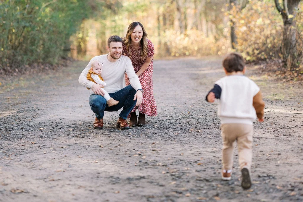 Alpharetta Doula photographer Helen sits wither her children smiling