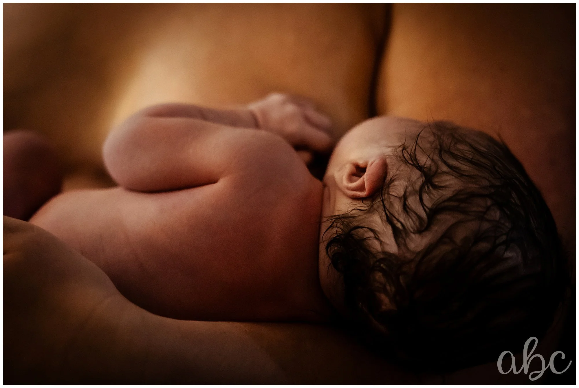 Mom enjoys skin-to-skin after her successful home birth.
