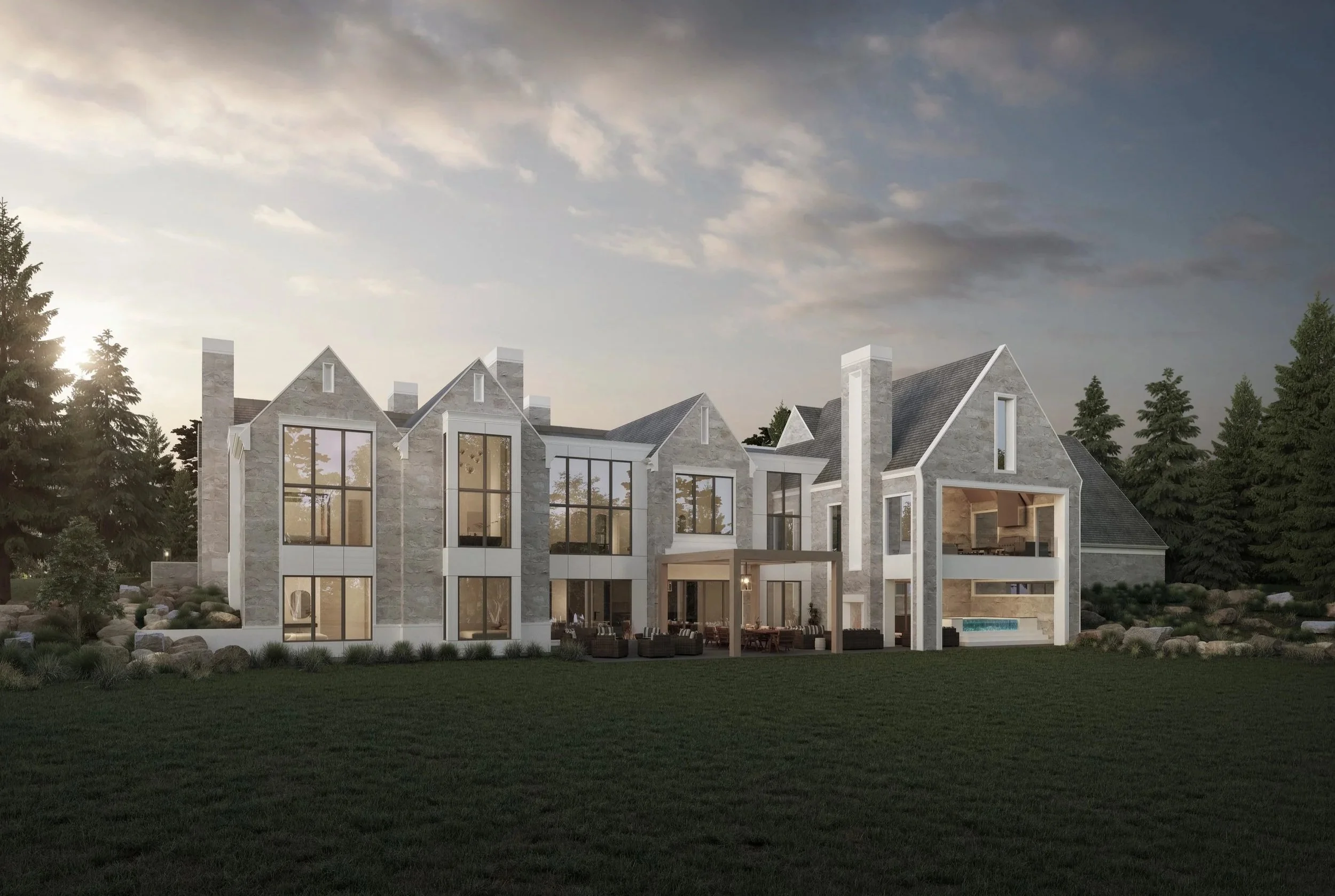 Rear exterior of 10,520 sq ft traditional estate-style home with large windows, covered outdoor living spaces, and panoramic Foothills views