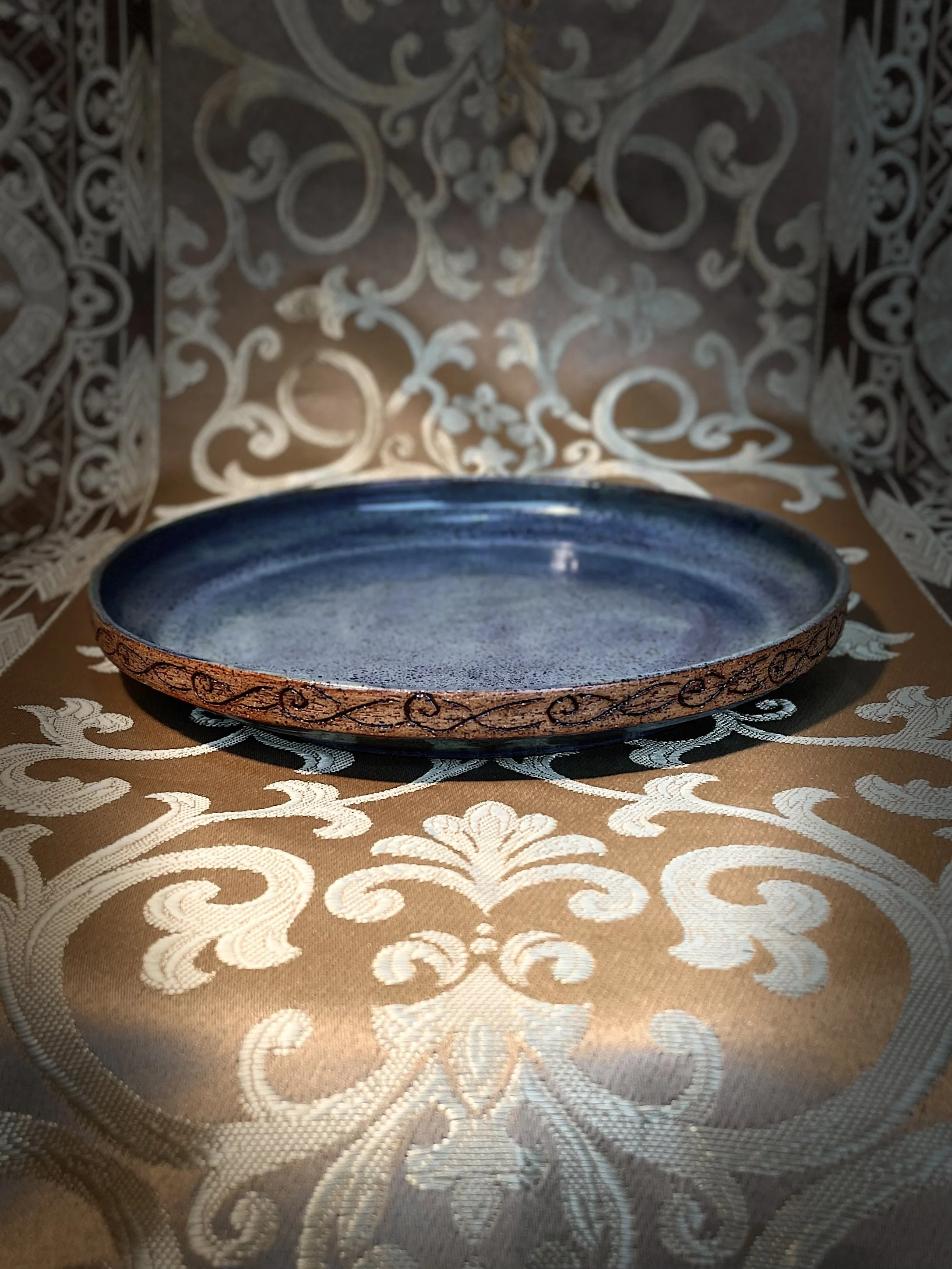 Elegant Blue Glazed Ceramic Plate with Filigree