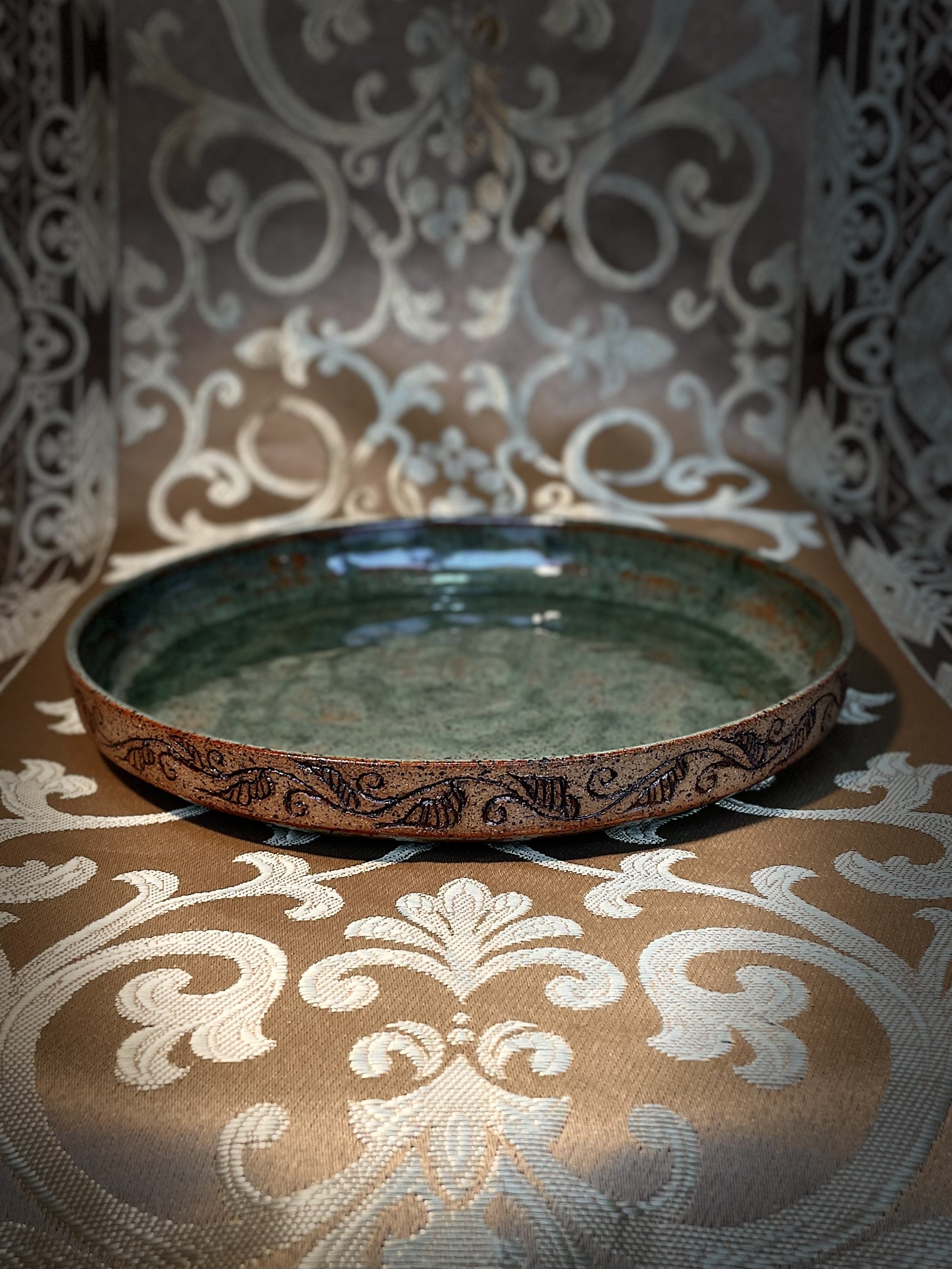 Elegant Moss Green Glazed Ceramic Plate with Filigree Design