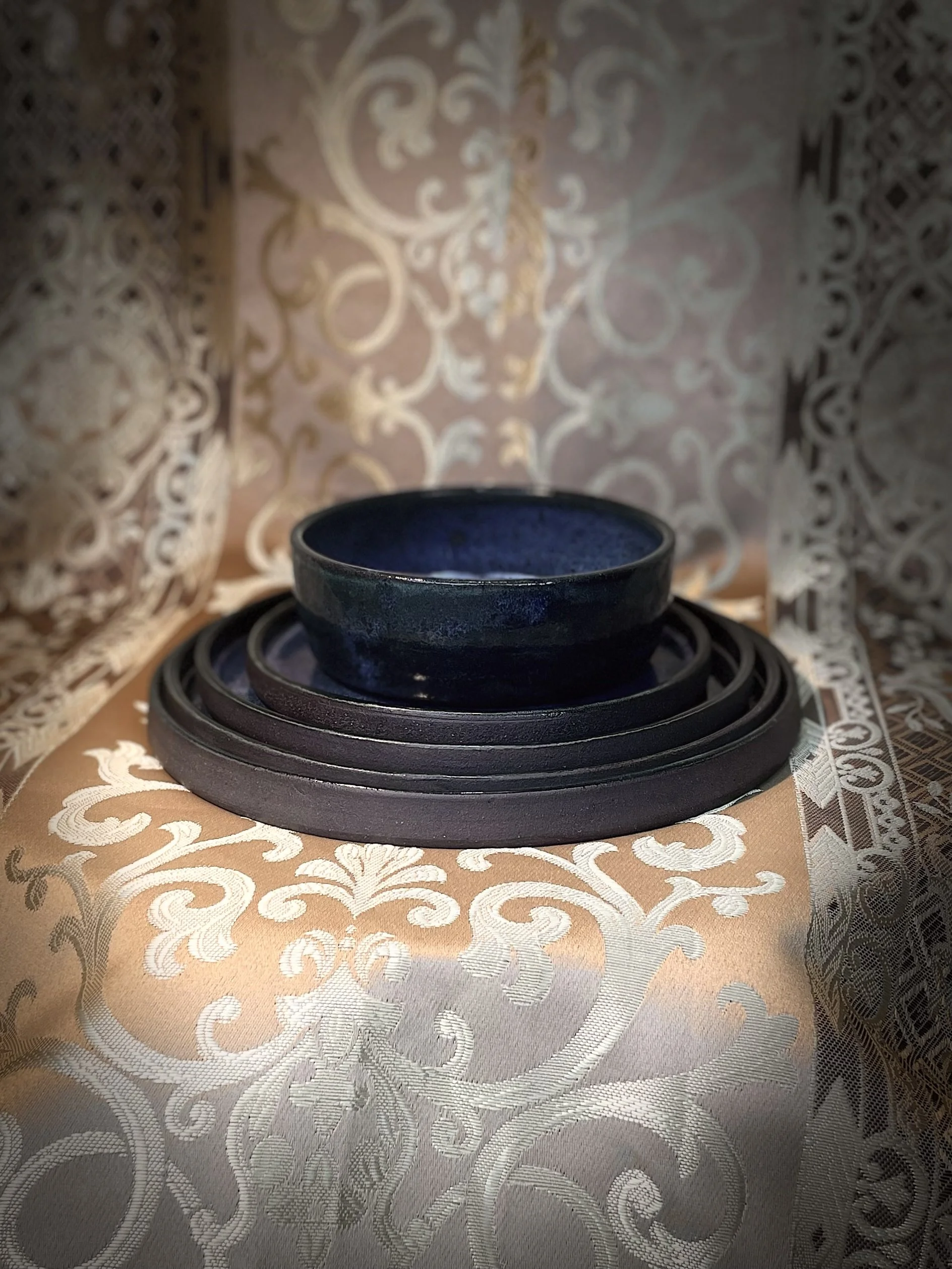 Artisanal Clay Dining Set with Rich Blue Glaze