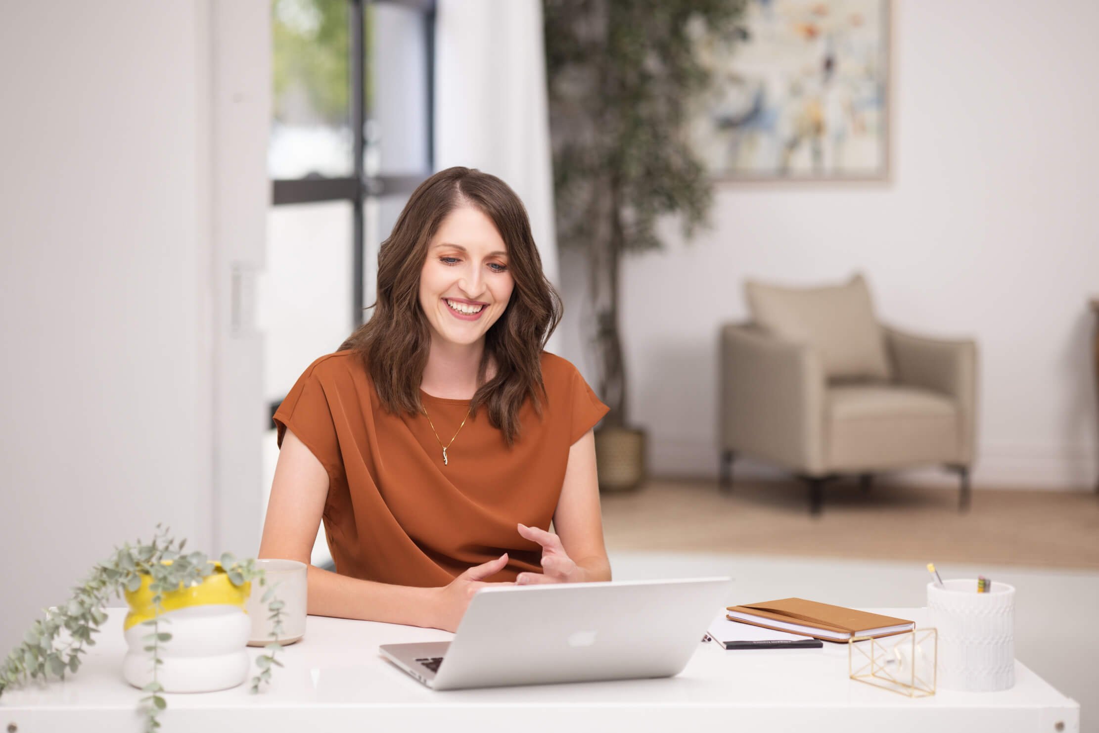 Woman in a virtual trauma therapy session from home — online telehealth therapy across Minnesota