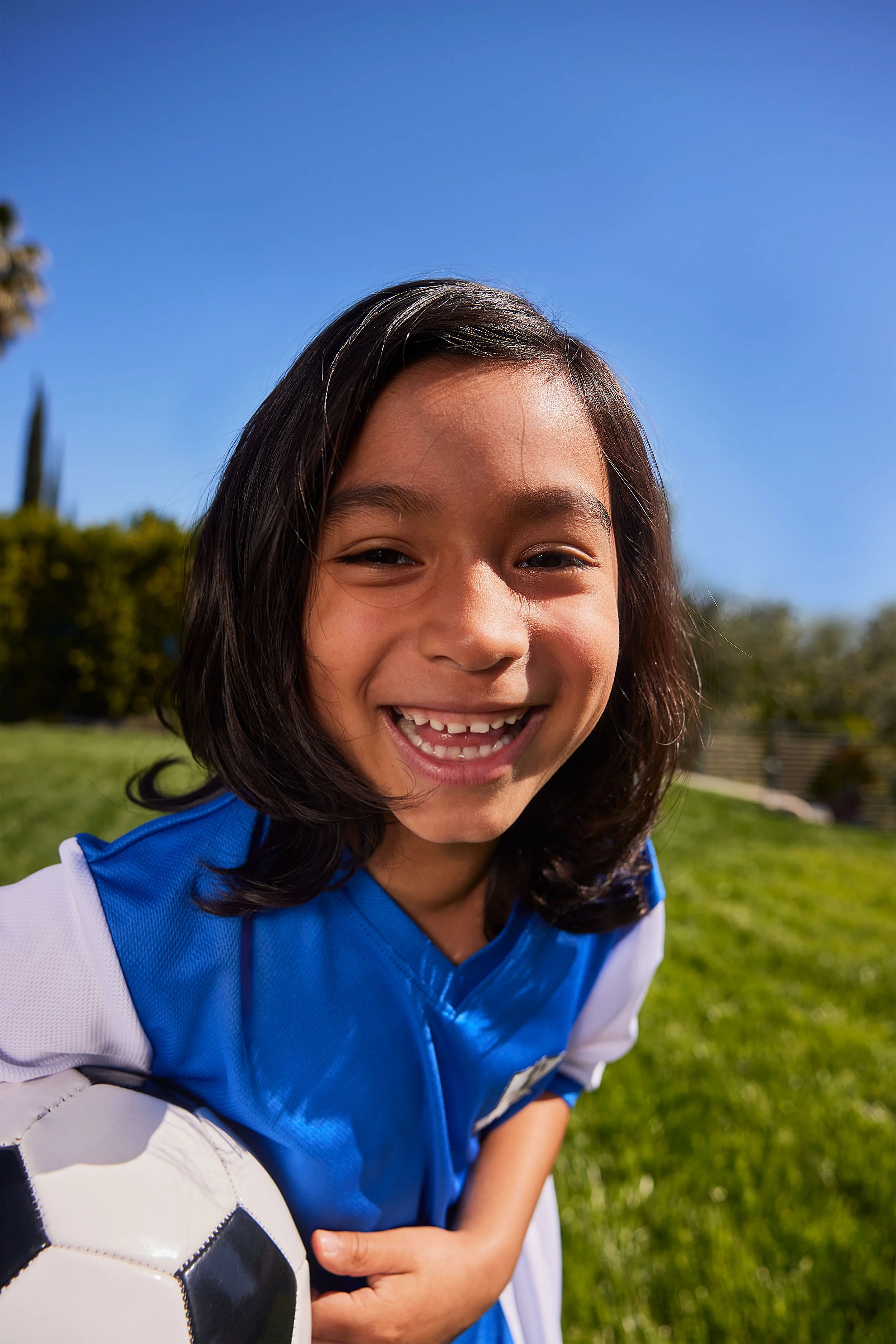 Final-2814010-FY24-Q2-Outdoor-Play-Child-in-team-sports-jersey-Portrait_0077-SELECT.jpg