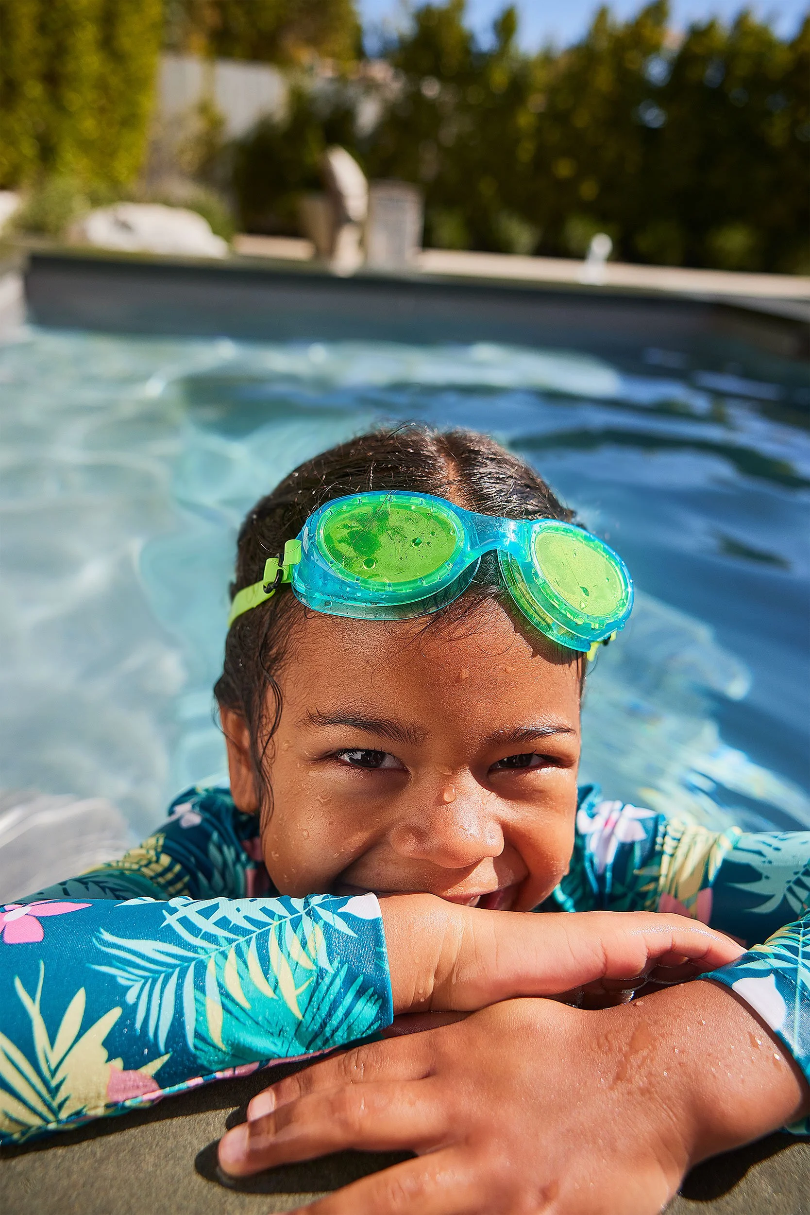 Final-2814010-FY24-Q2-Outdoor-Play-Child-wet-hair-goggles-rash-guard-Portrait_0245-SELECT.jpg