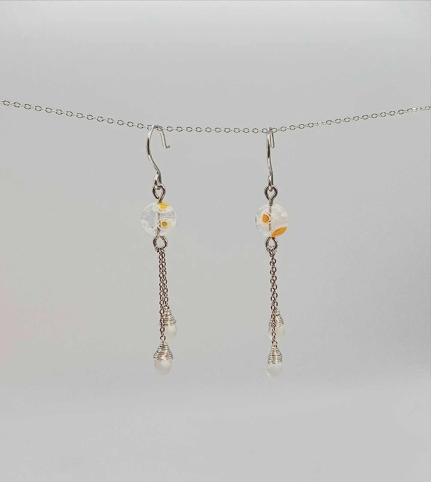 Earrings for Jackson! :) 
&bull;
&bull;
&bull;
&bull;
&bull;
#nycjewelry #wirewrappedjewelry #wirewrappedearrings #nycjeweler #dangleearrings #sterlingsilverearrings