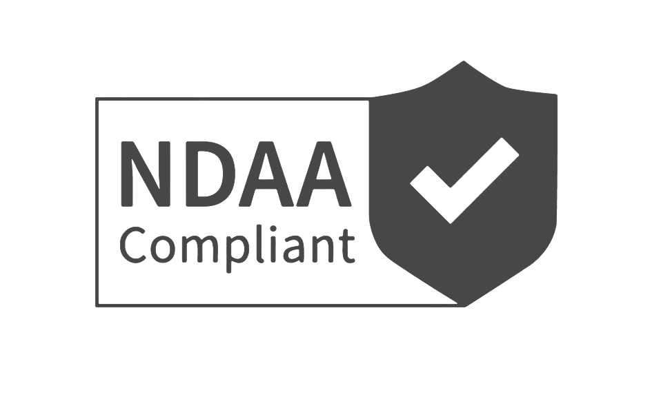 A black and gray badge displaying the text "NDAA Compliant" with a shield and checkmark icon.