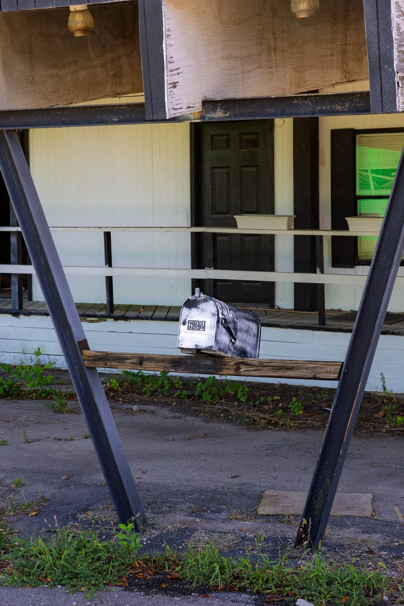 Alpine Haus Motel front view of old mailbox.