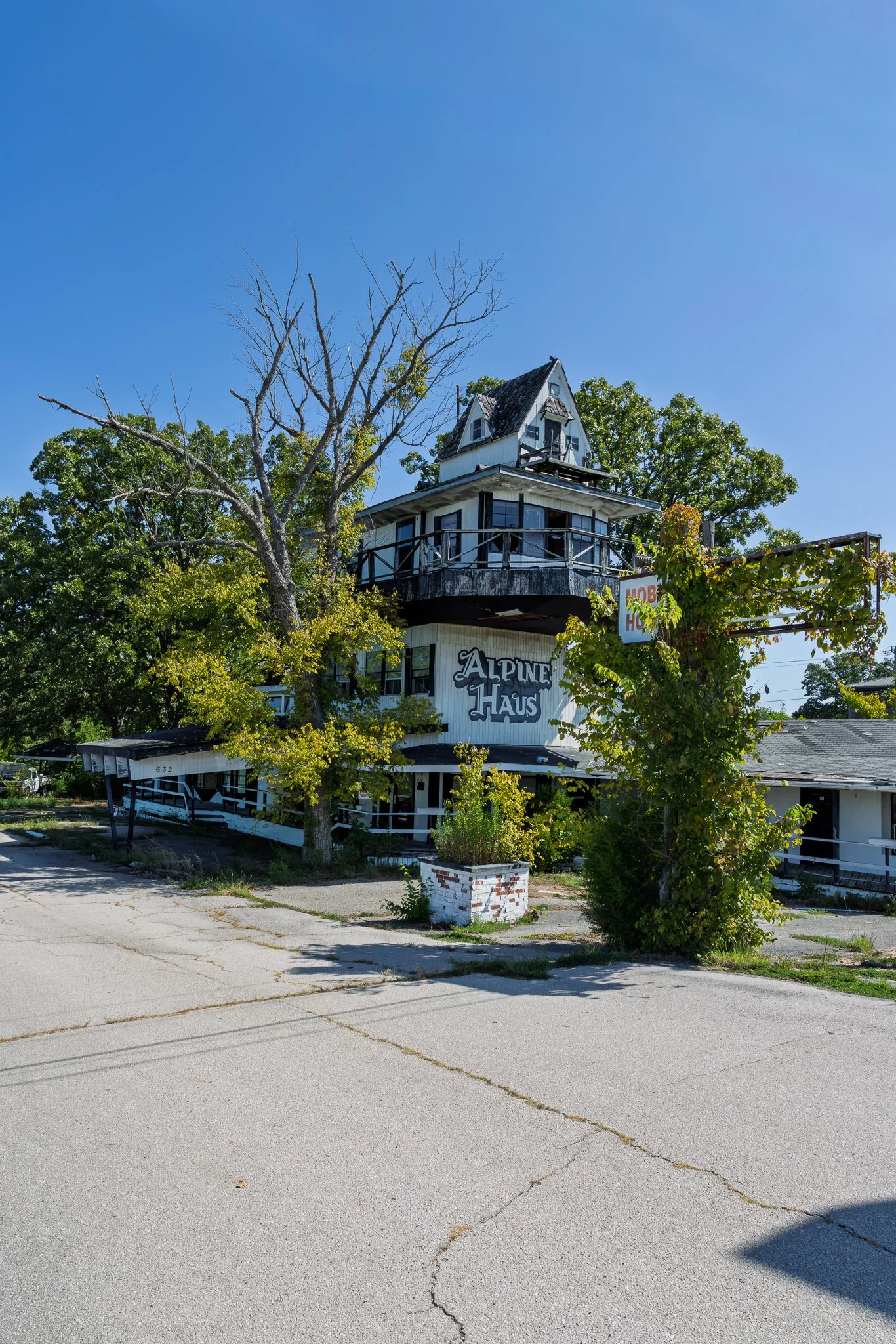 Angled view of Alpine Haus Motel exterior, showing multiple units.