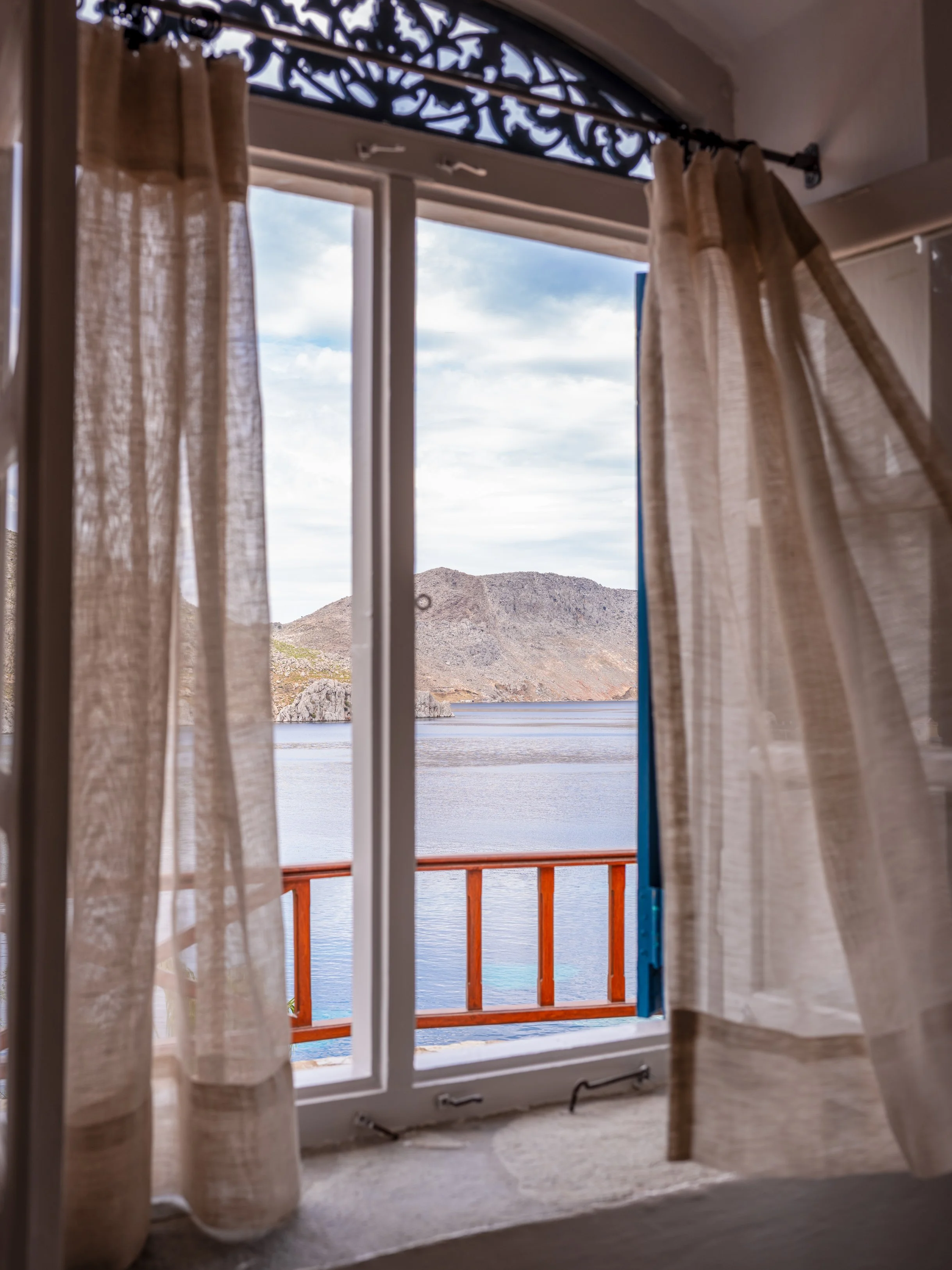 Thalassa suite bedroom 2 window with sea view at The Selene Greece, Symi