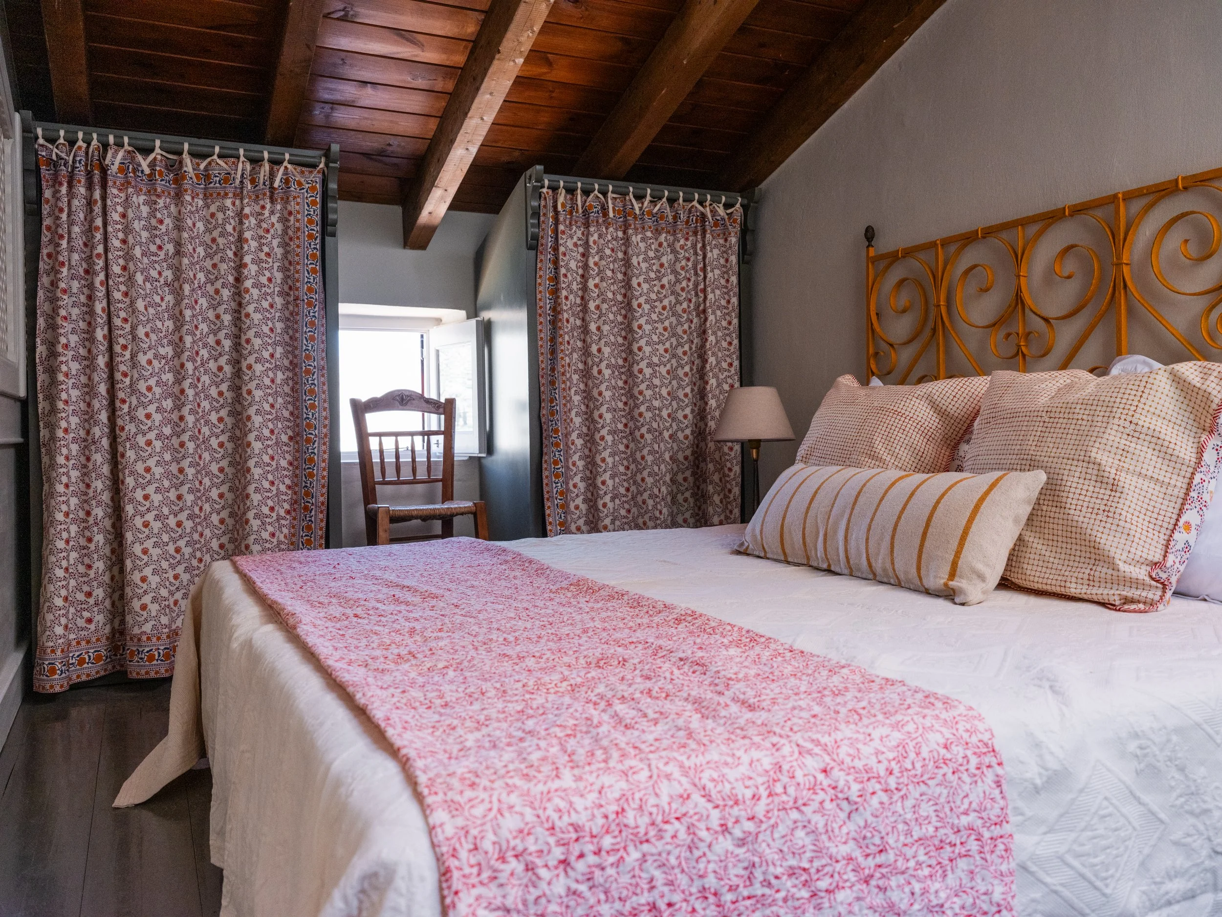 Nykta suite bedroom at The Selene Greece, Symi, with sea view