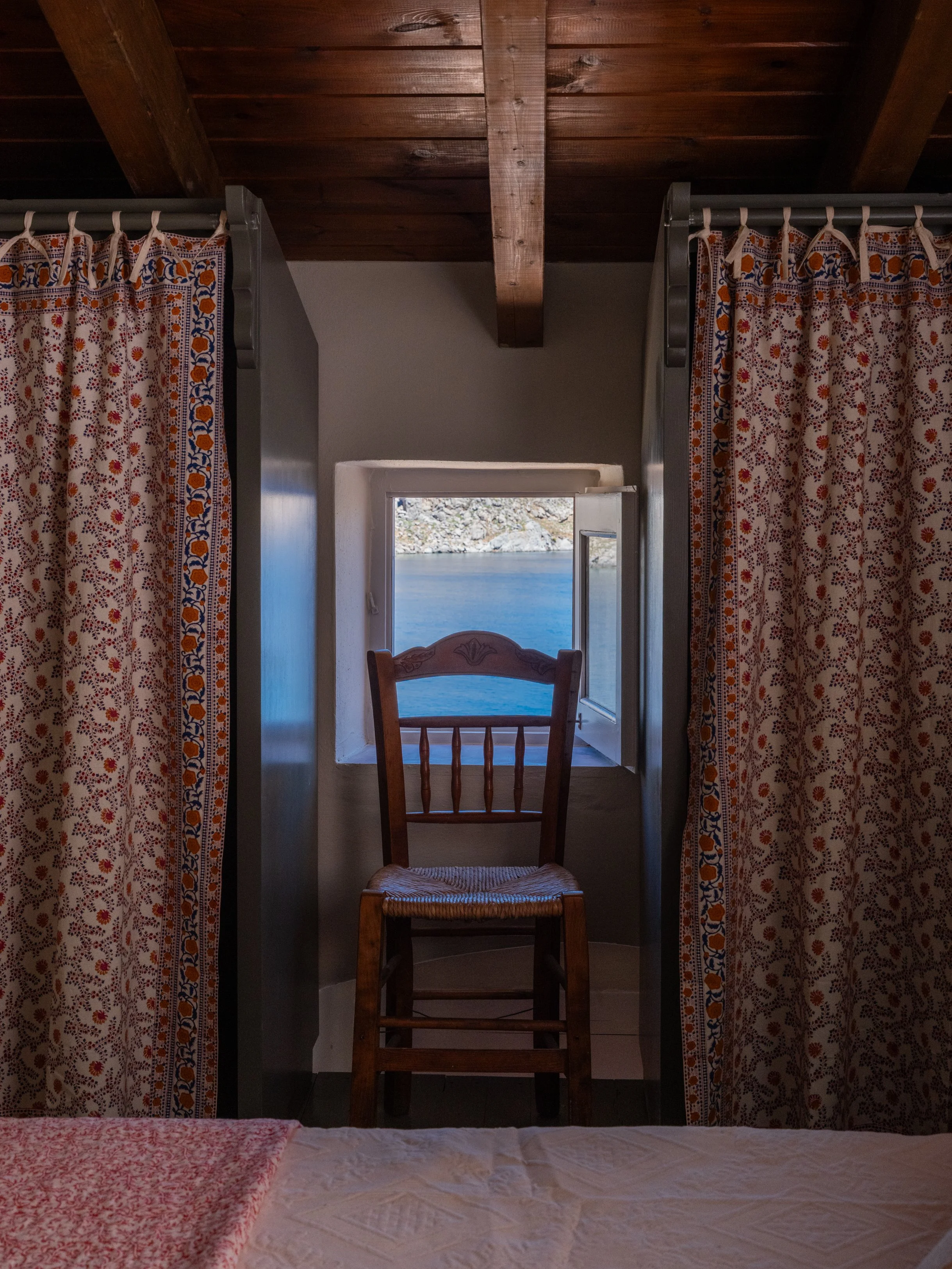 Nykta suite bed with sea view at The Selene Greece, Symi