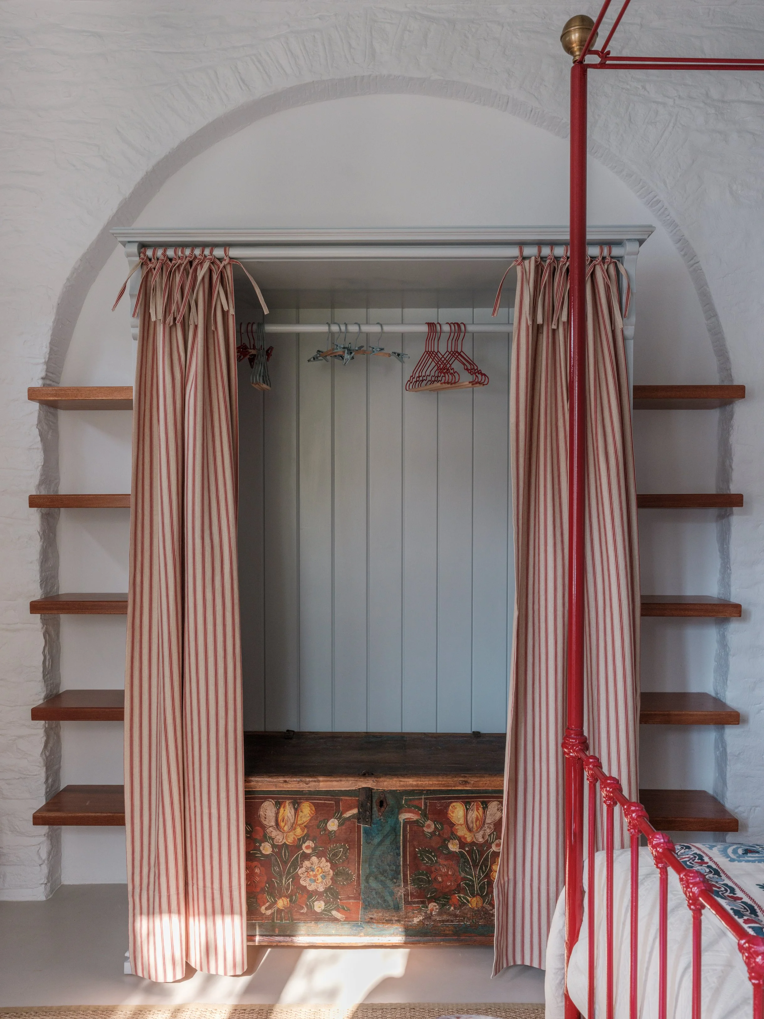 Thalassa suite wardrobe and antique chest at The Selene Greece, Symi