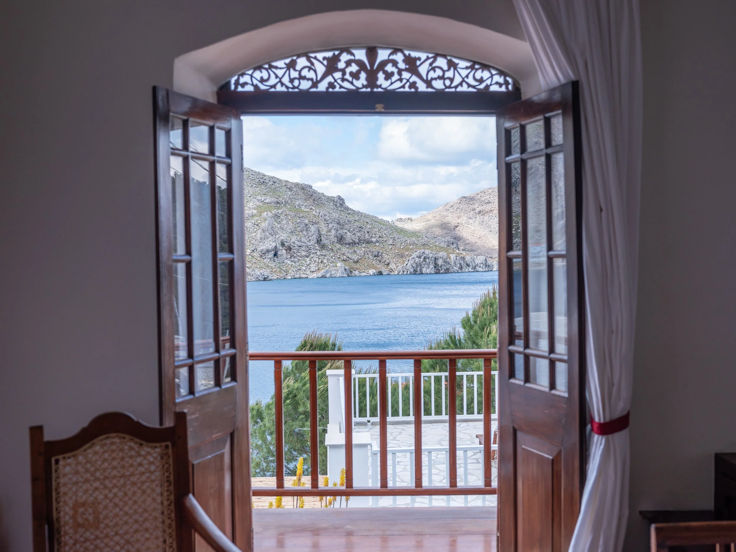Selini suite private balcony with seaview at The Selene Greece Symi