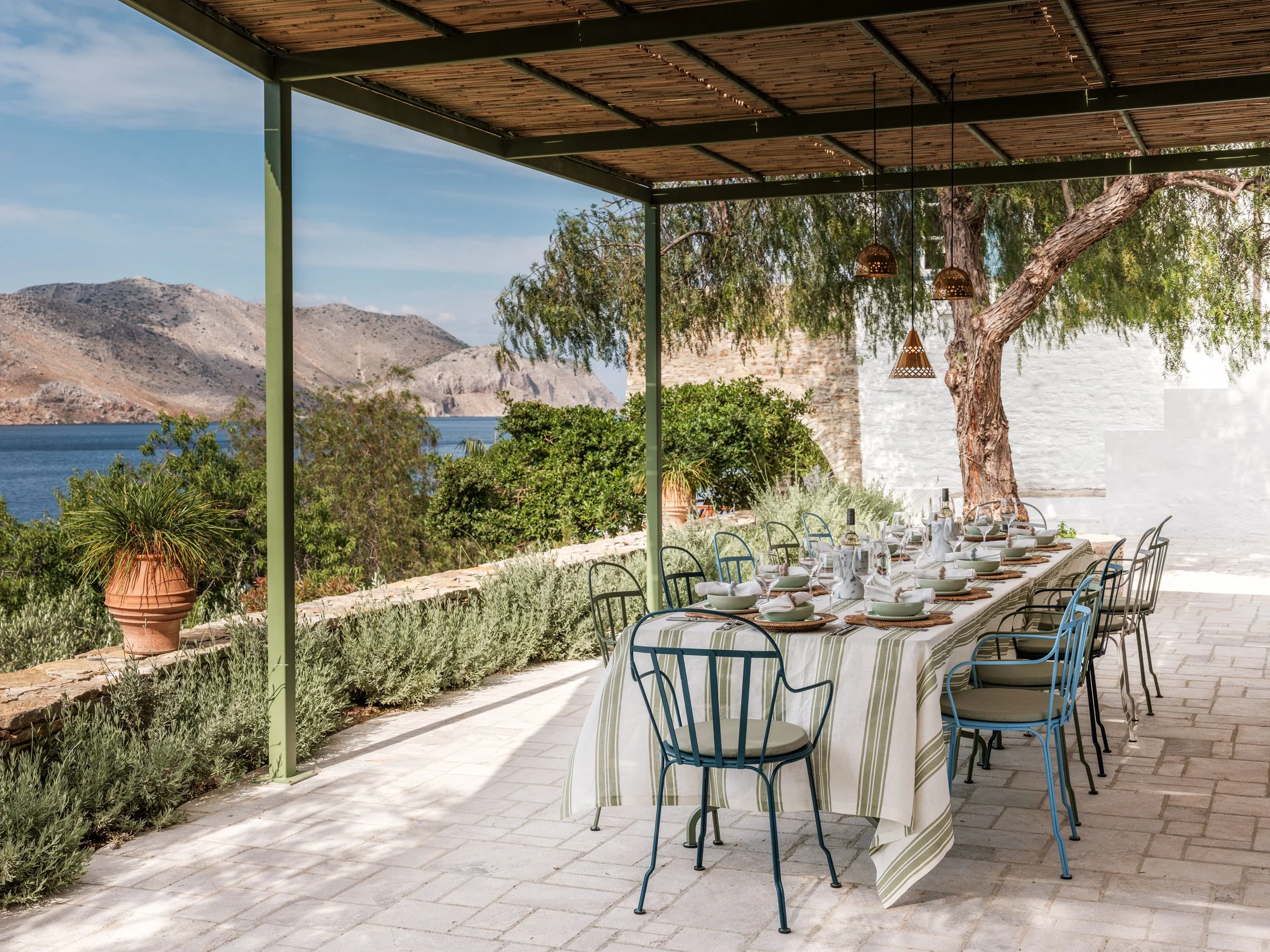 selene-greece-terrace-dining-table-house-view-long-symi.jpg