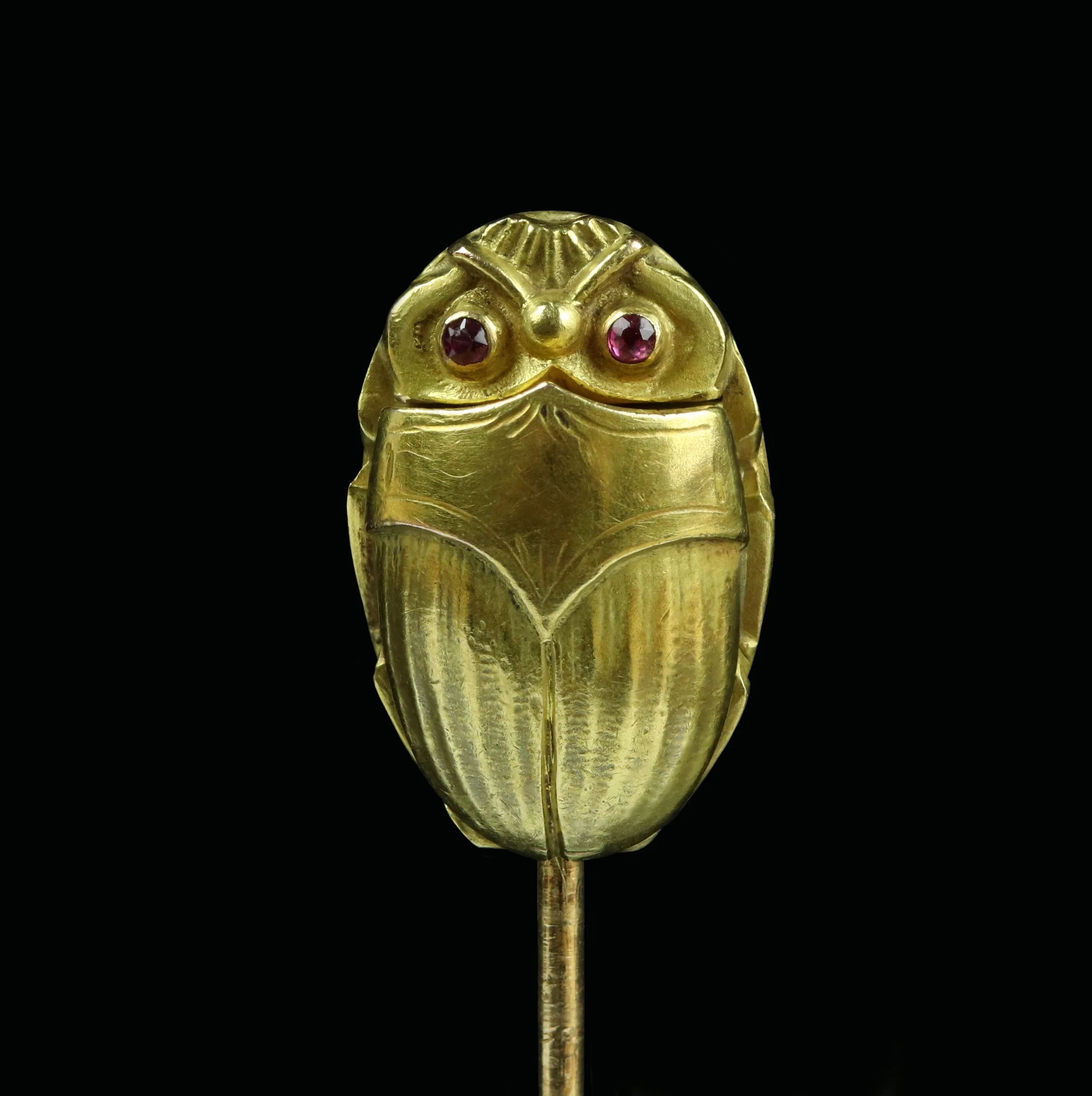Scarab stickpin with concealed locket, by Carter, Gough & Co.