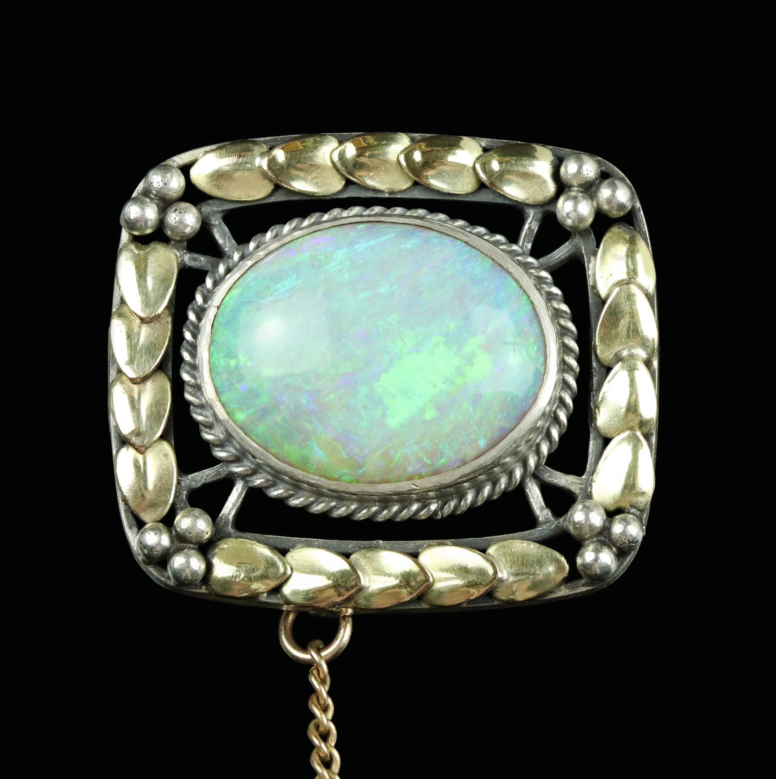 Arts & Crafts silver and gold opal brooch