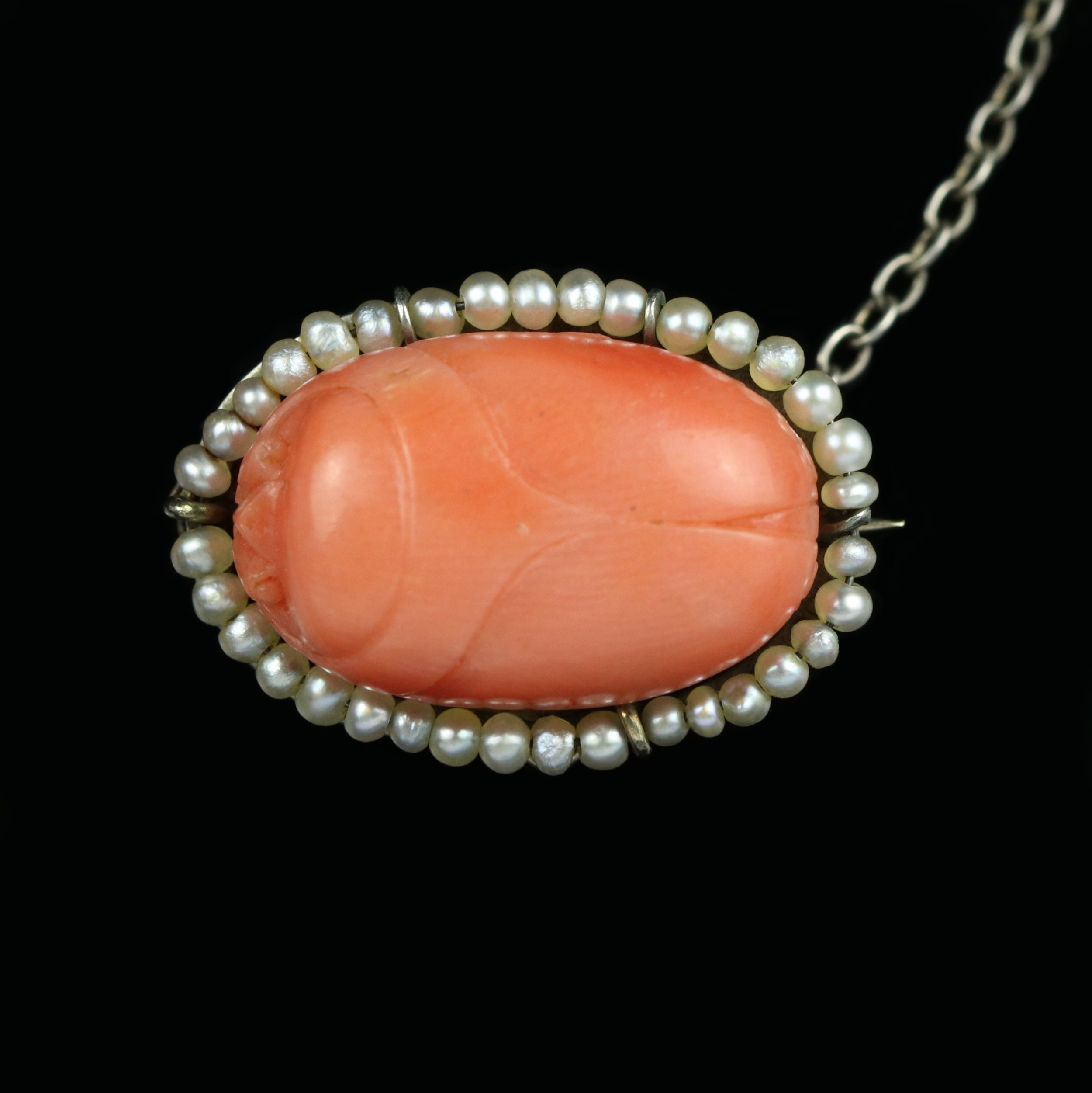 Art Deco carved coral scarab and seed pearl brooch