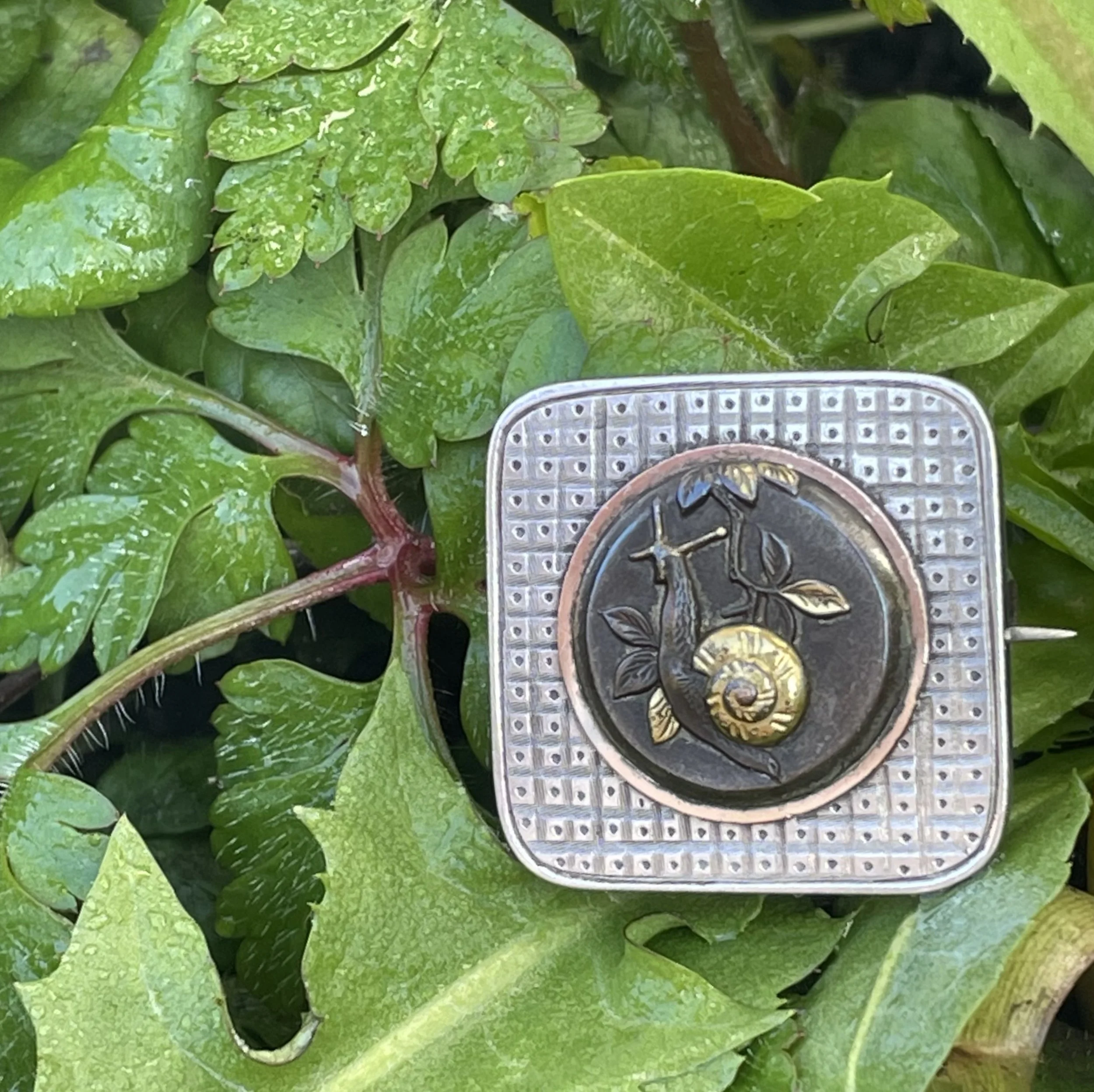 Japanese silver and mixed metal snail brooch