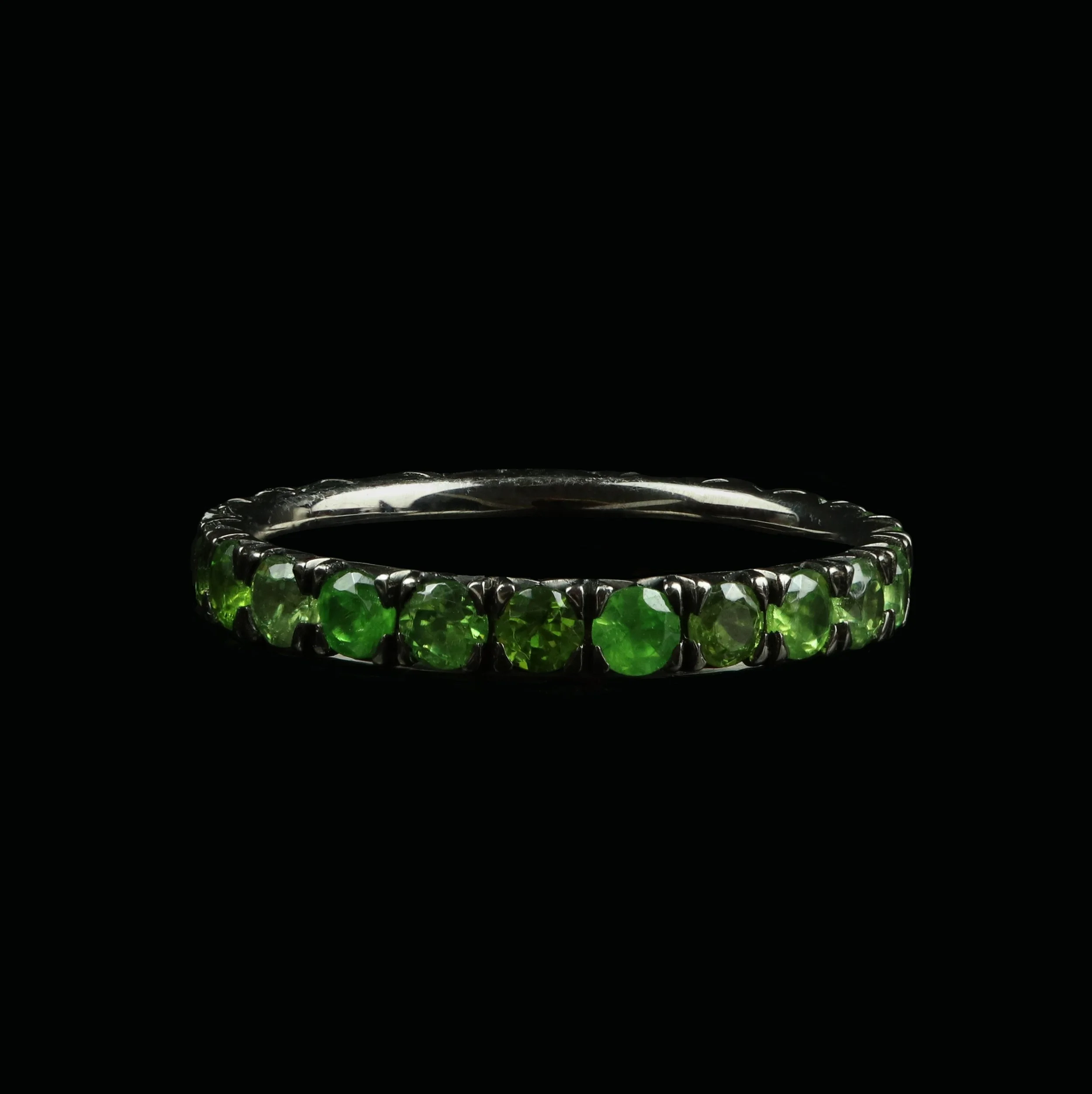 Demantoid garnet eternity ring