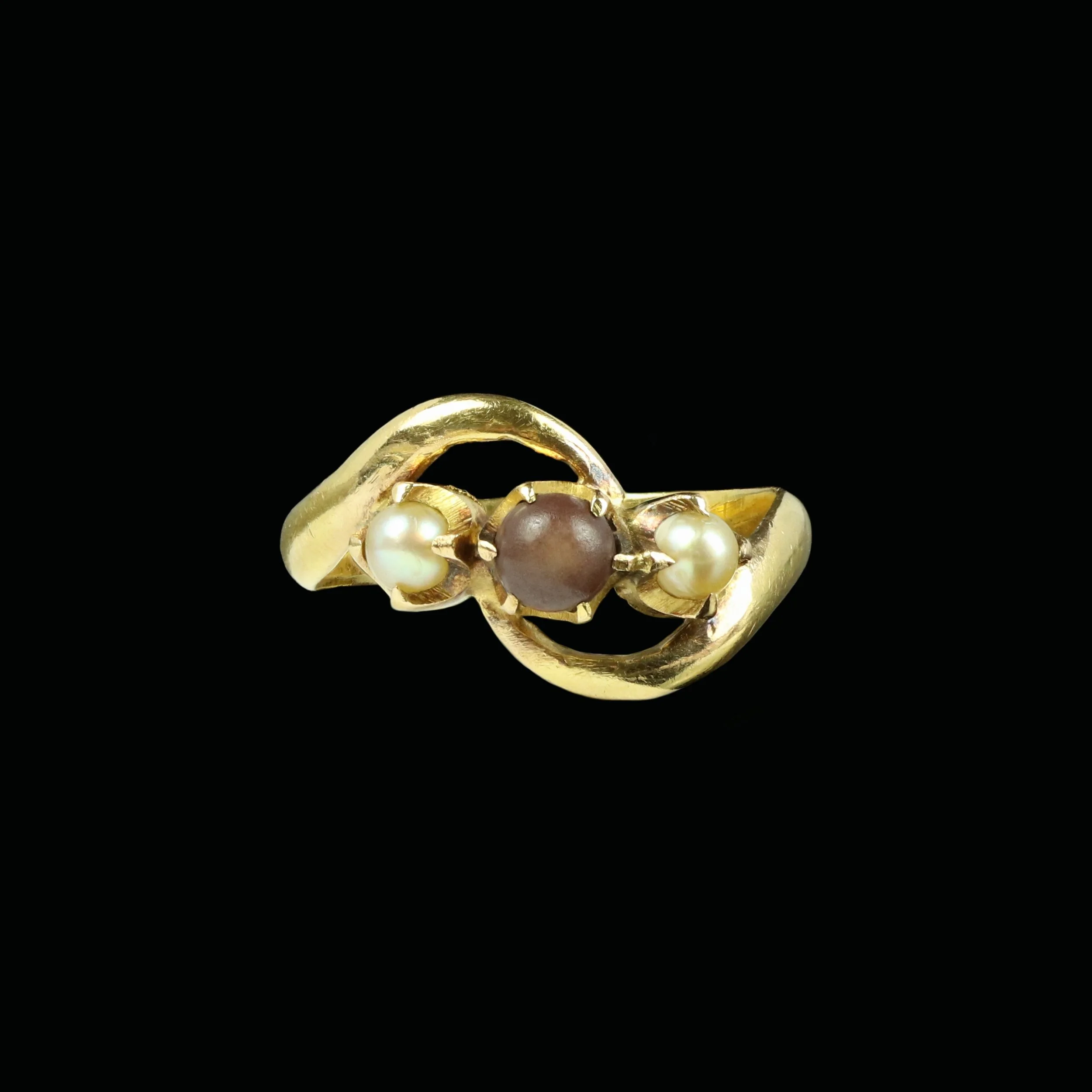Rare and unusual natural brown pearl crossover ring