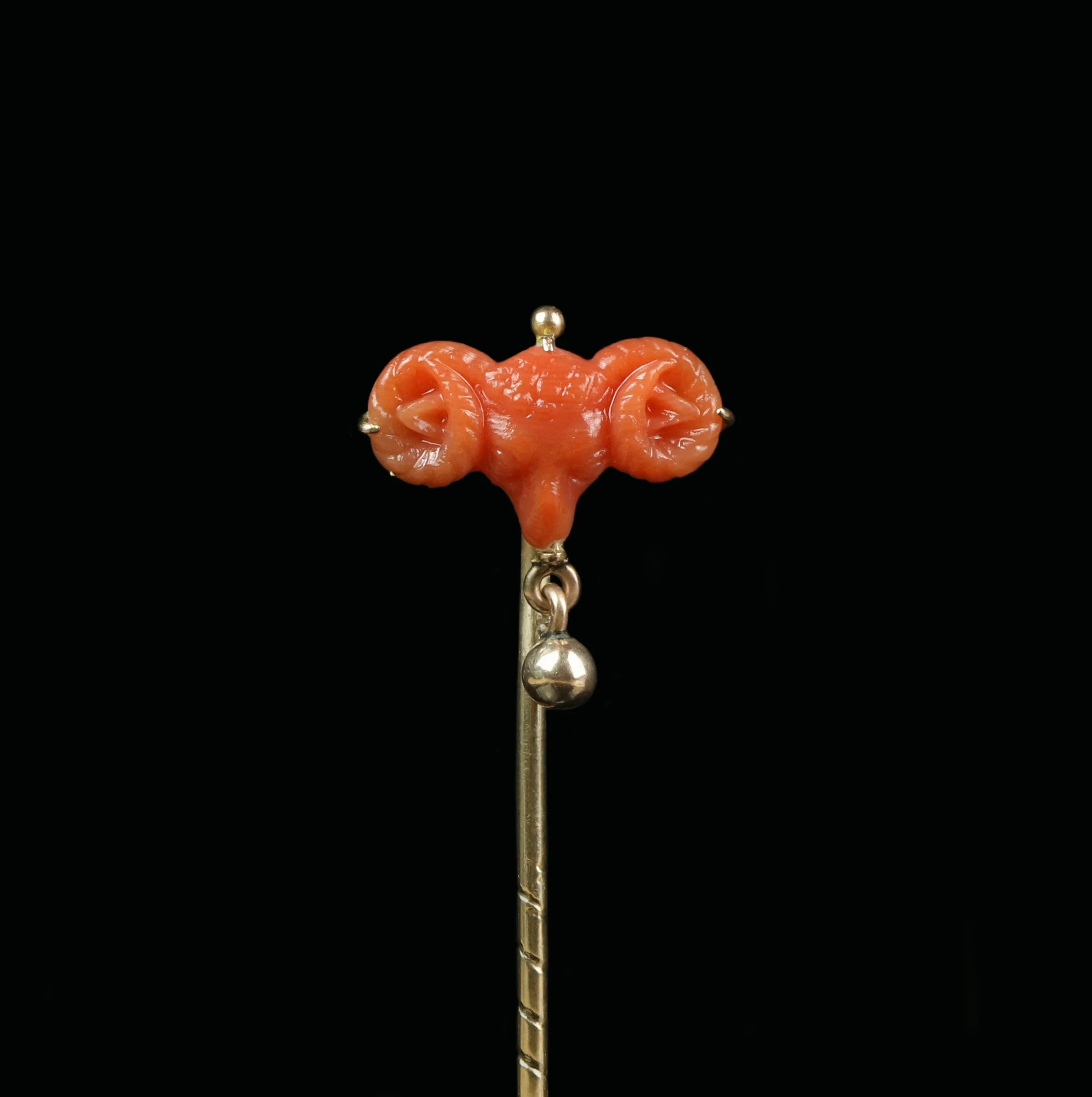 Victorian Archaeological Revival gold coral Ram stickpin