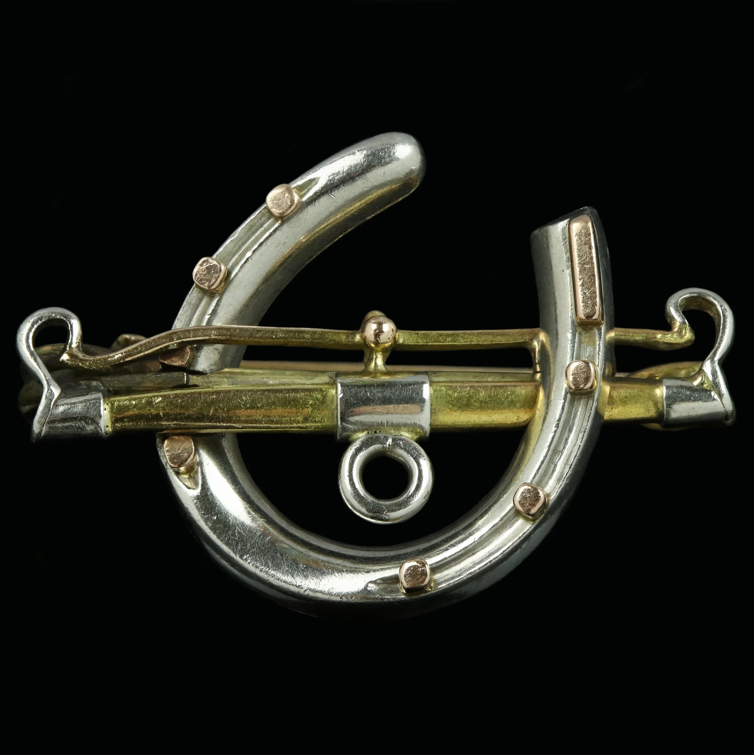 Early 20th century platinum and gold horseshoe brooch