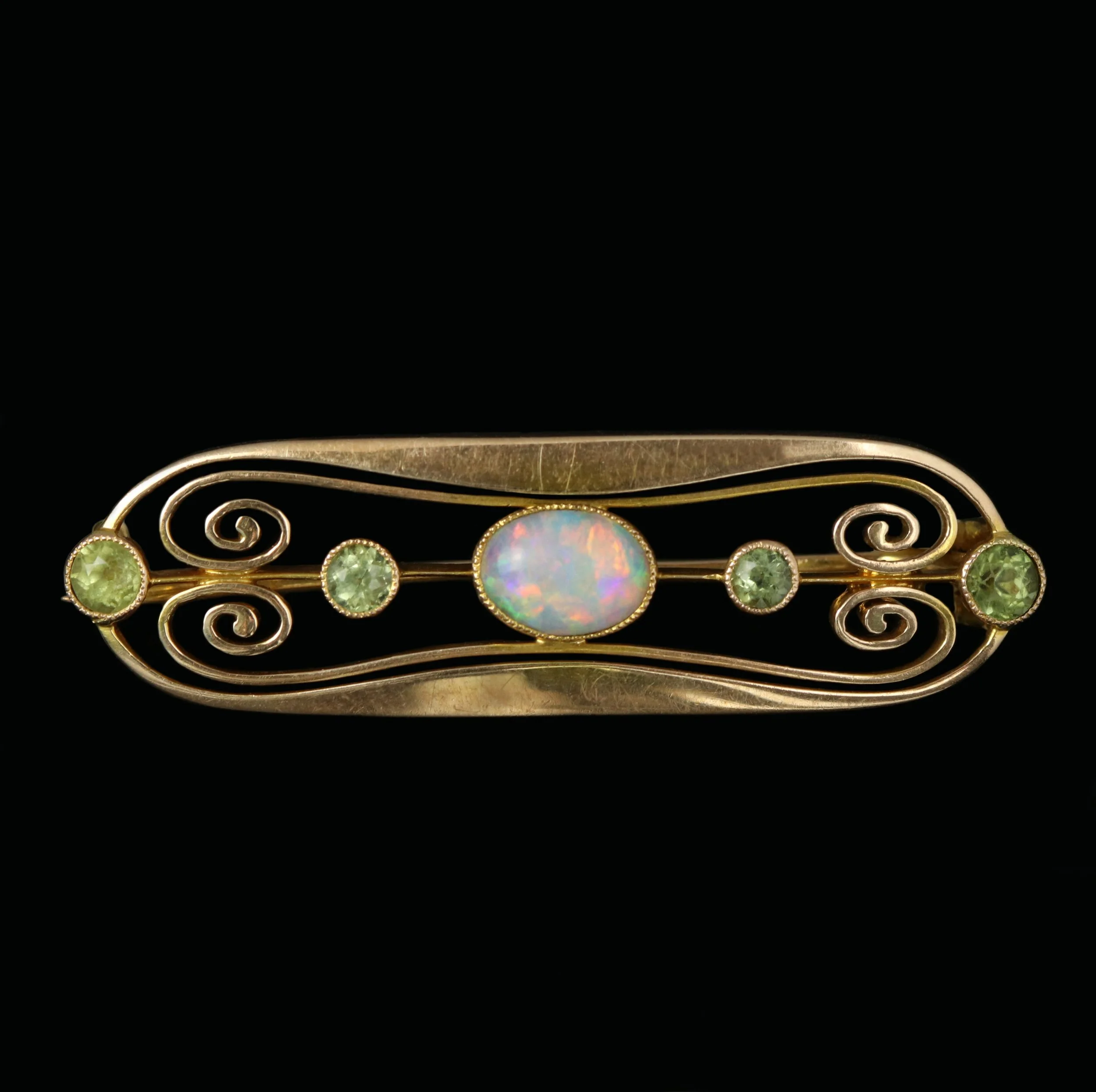 15ct gold opal and peridot brooch, by Murrle Bennett & Co.
