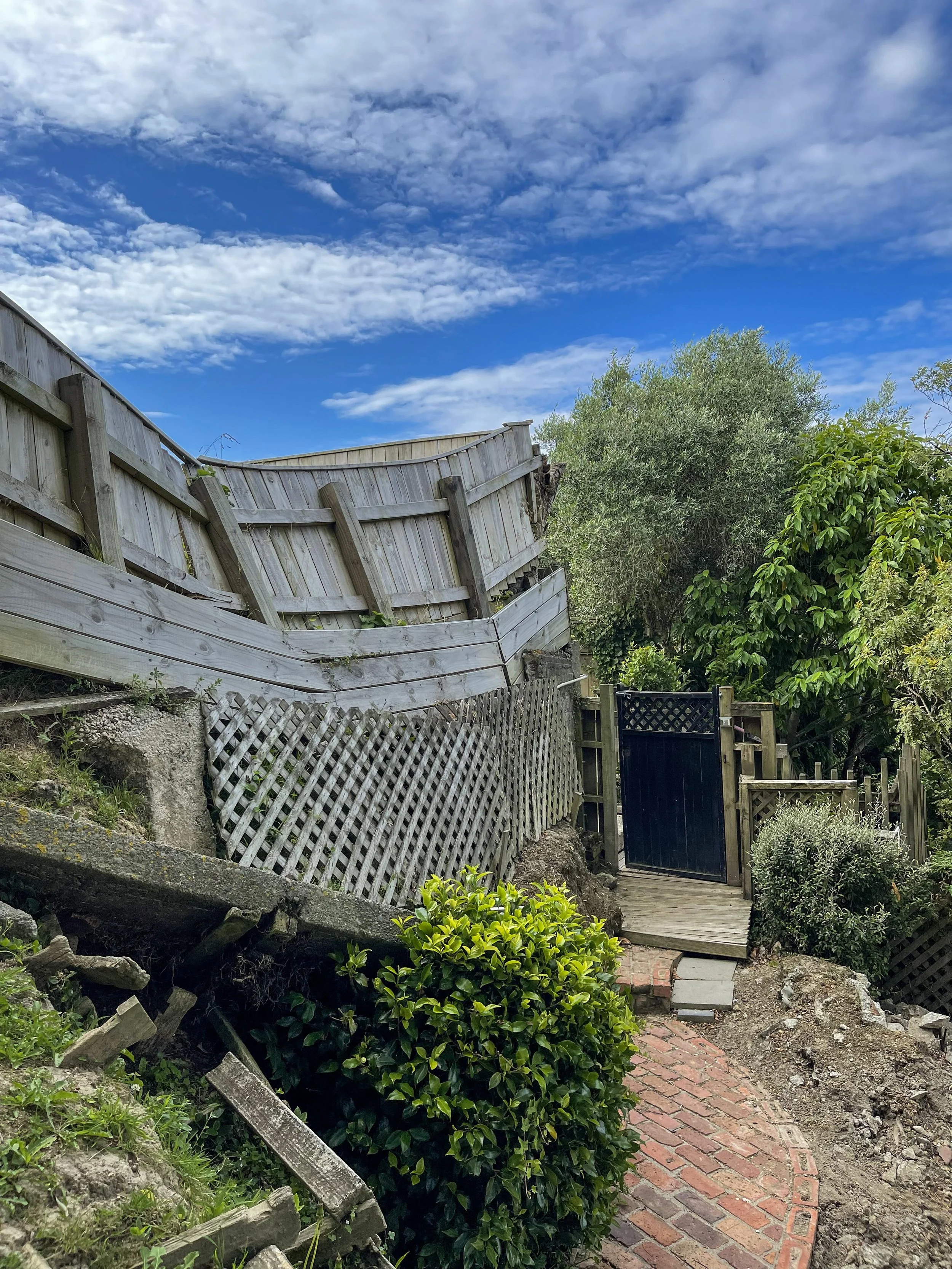 Another angle, highlighting the fallen out concrete pieces of retaining wall from the main structure.