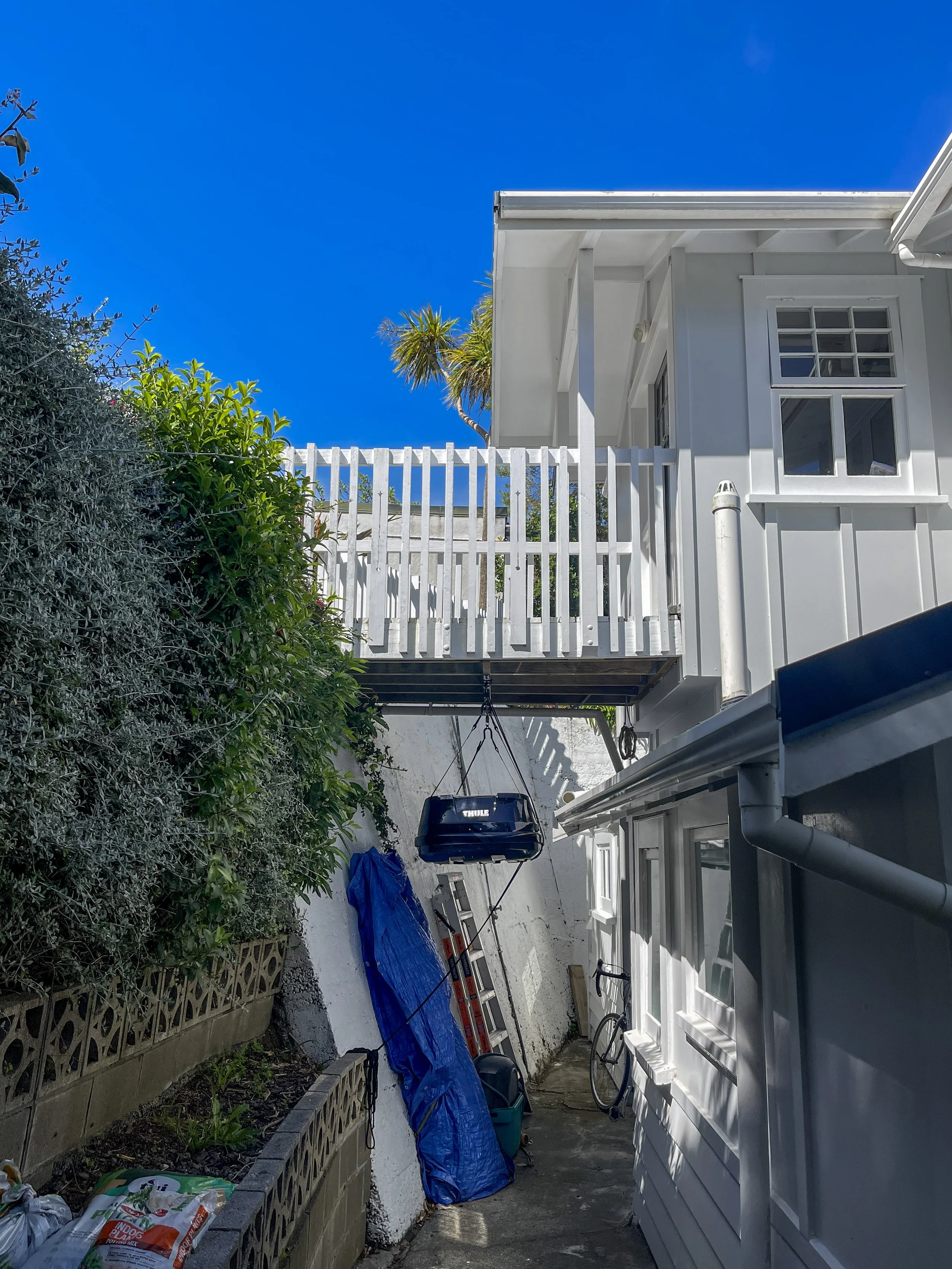 Bottom level view up to the primary access to the home, which was to be retained.