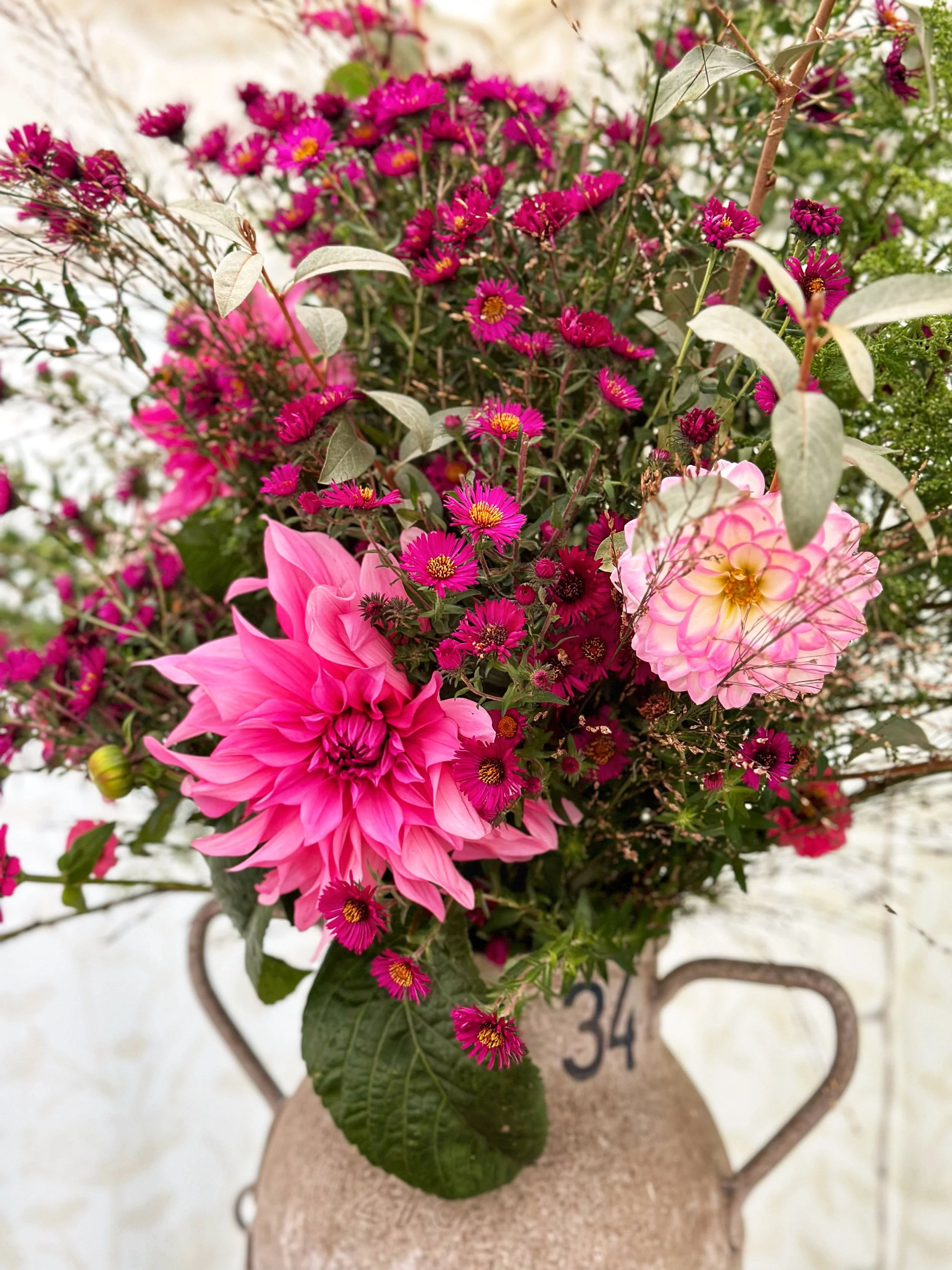 Pink flowers in an urn.jpg