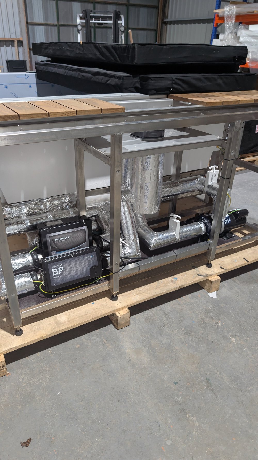 The insulated internals and heater components on a frame.
