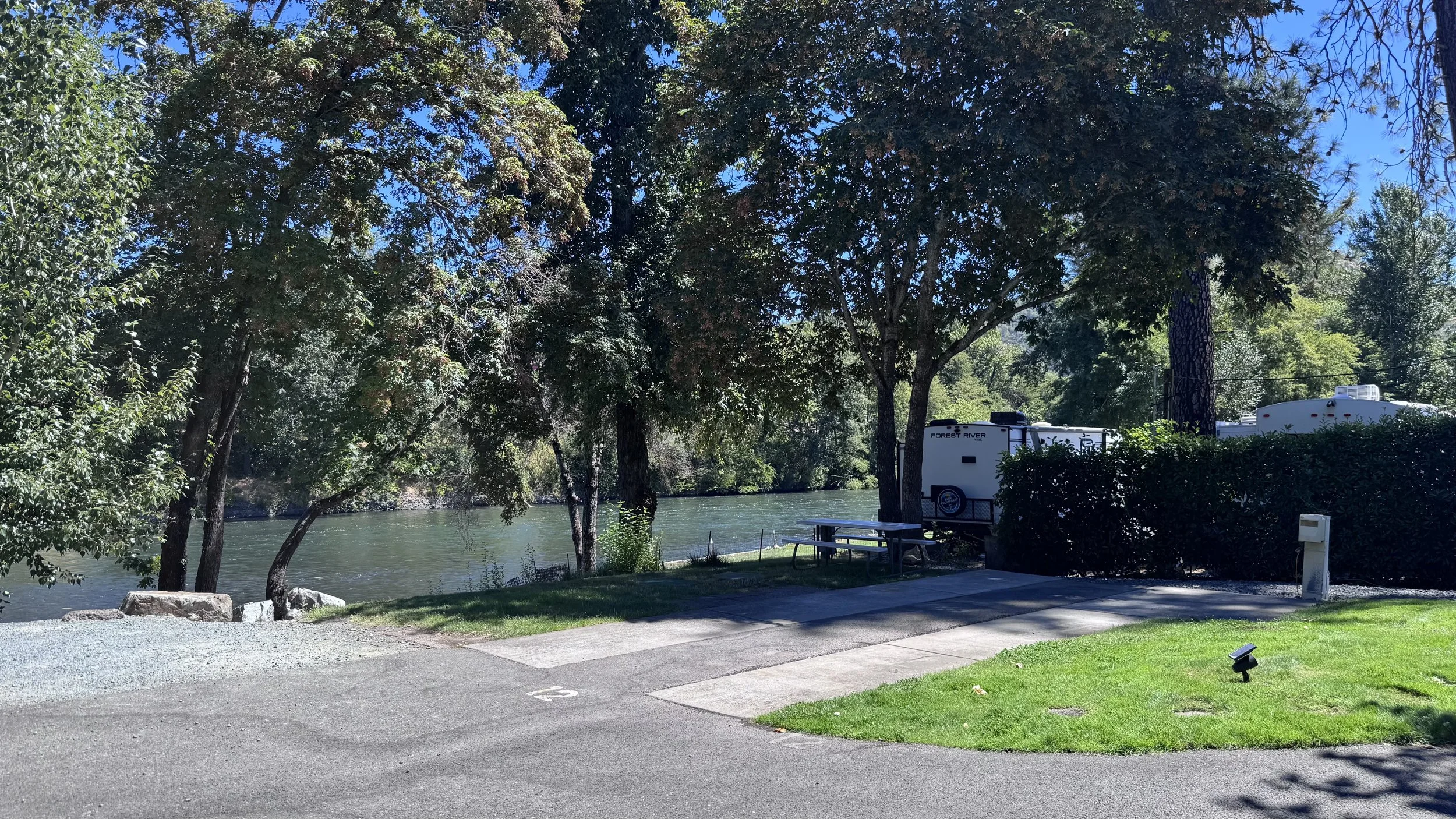 Riverfront back-in RV site with cement pad