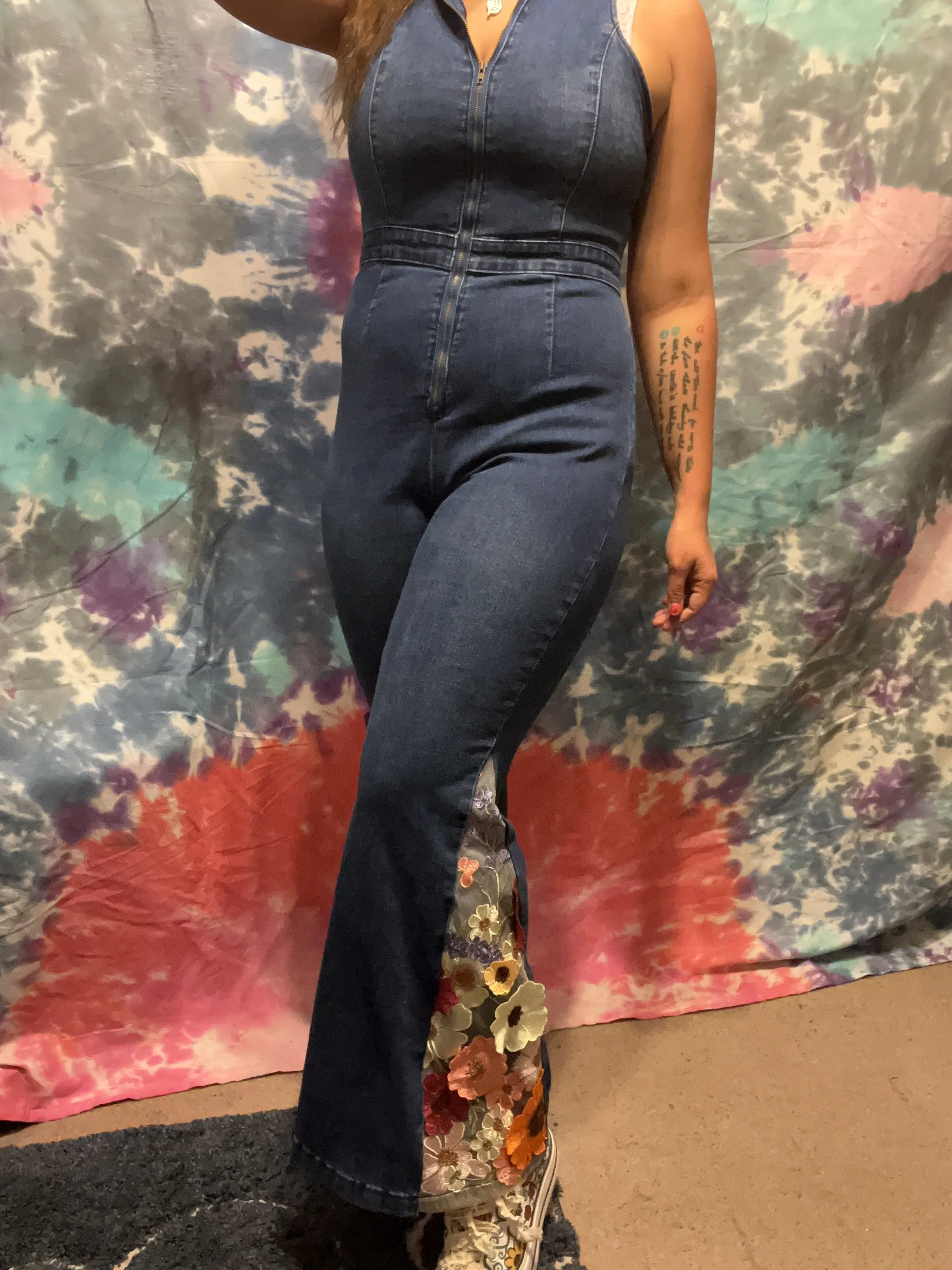 Bell-bottom jumpsuit with 3D floral flare detail