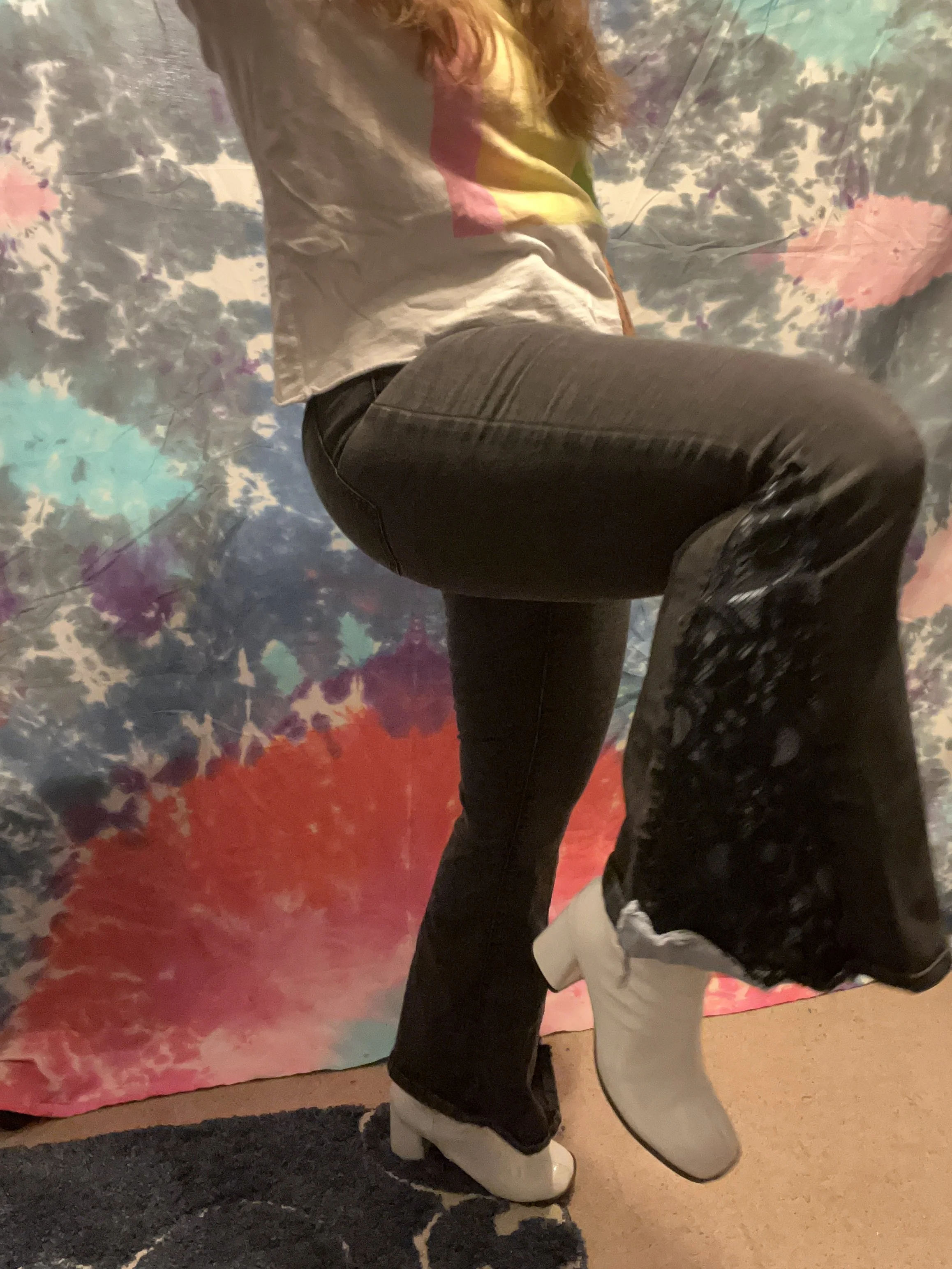 Black denim bell-bottoms with blue denim and black lace flare detail