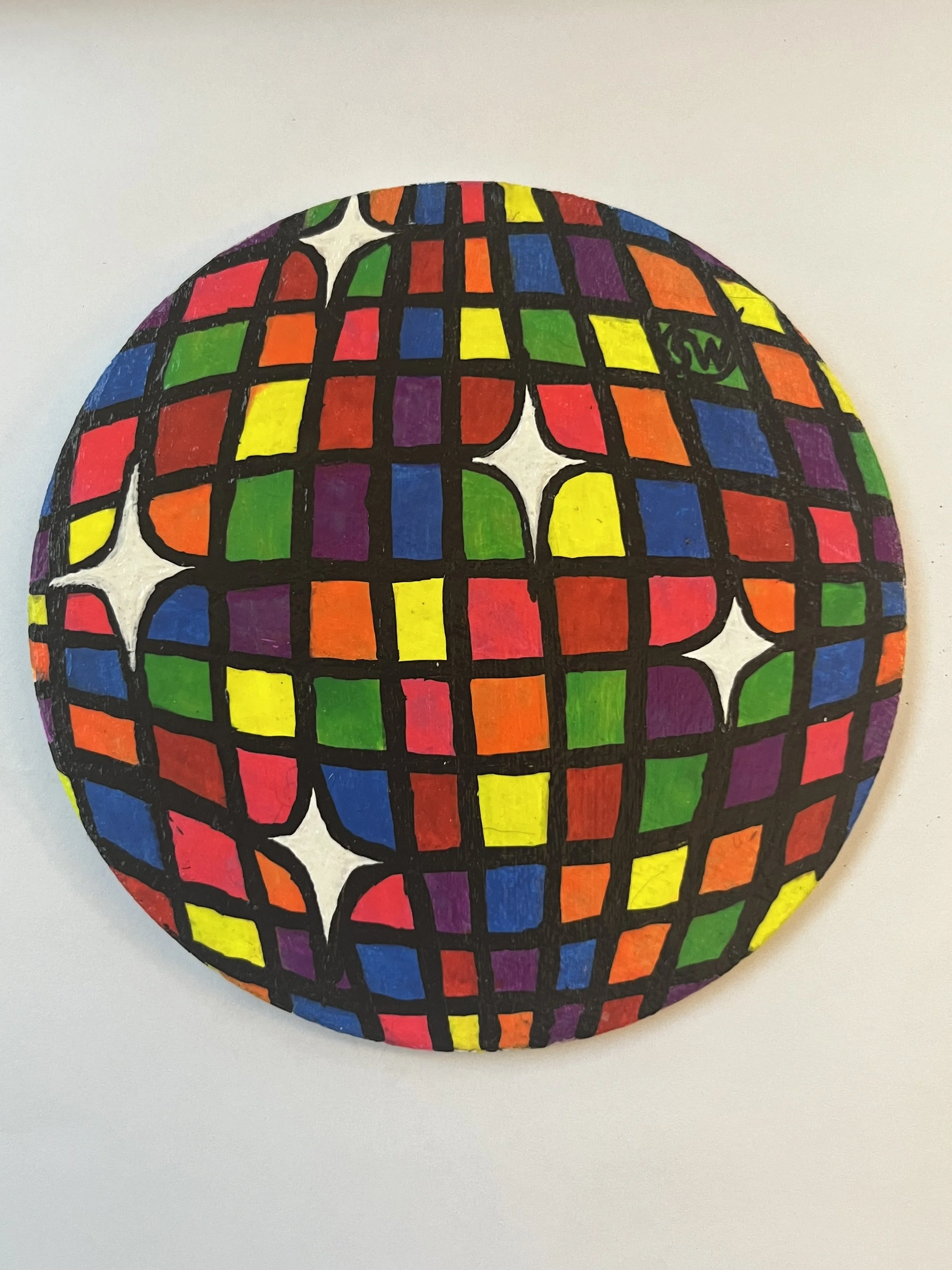 Cartoonish neon rainbow disco ball (glows in blacklight) (in shop)