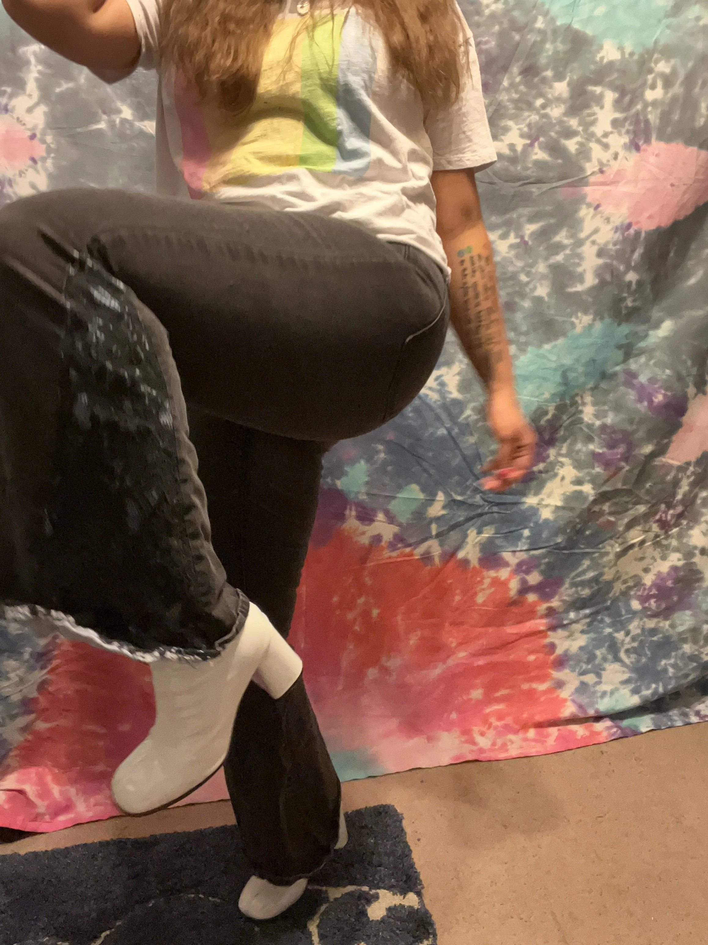 Black denim bell-bottoms with blue denim and black lace flare detail