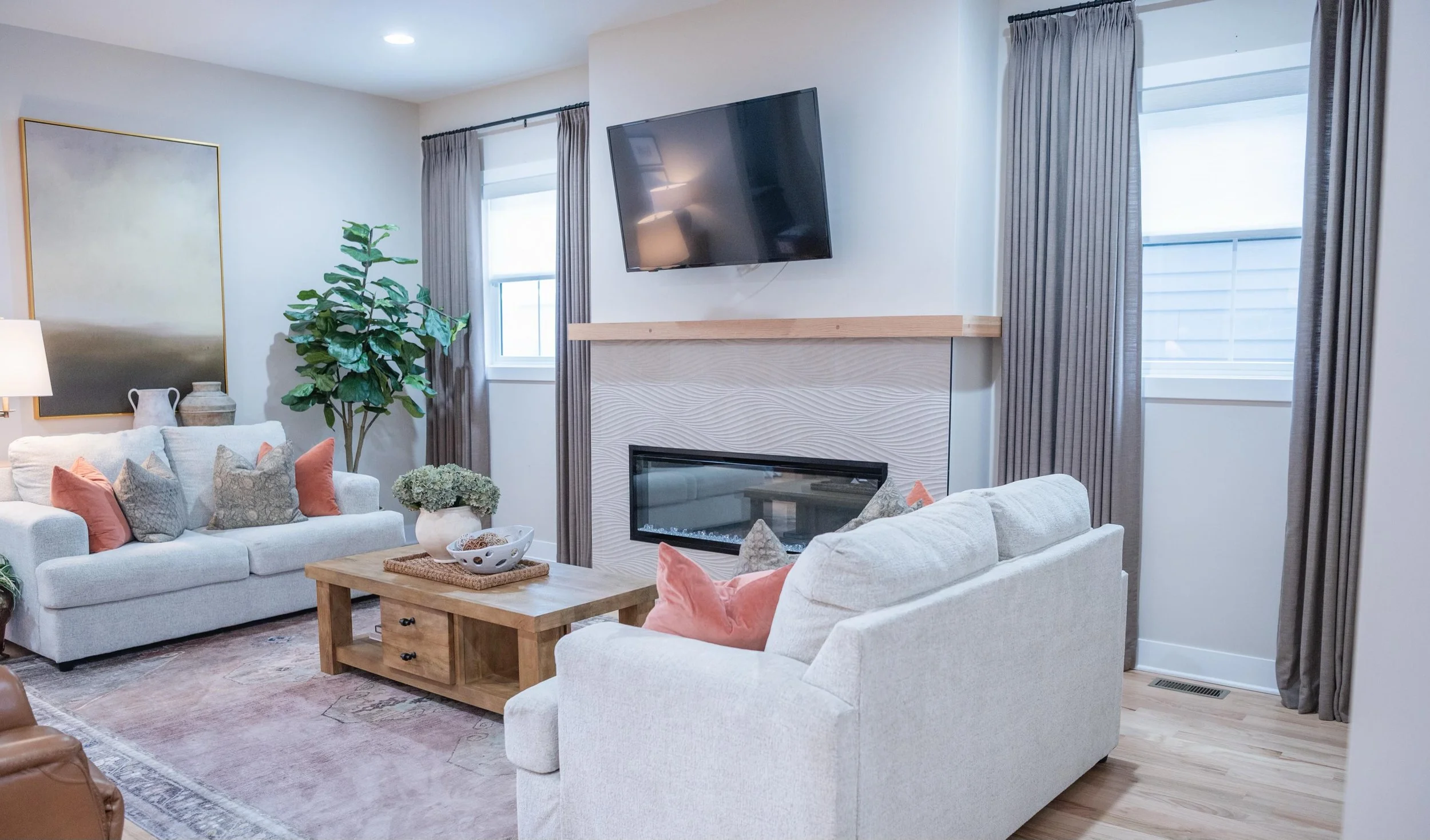 Project Central Avenue. Clients needed more additional seating to seat guests. They already had the sofa since it was new, we just ordered a second one to balance out the room. Sometimes you just need an interior designer to just come in, look at the