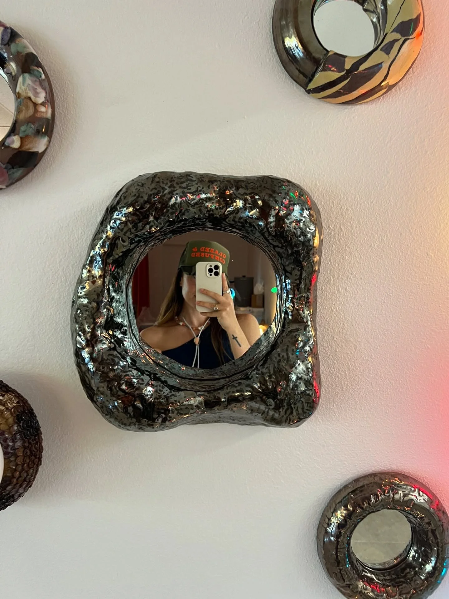 BOLO TIES!! Recycled Nerikomi clay from upcoming collection with @guimoufarrige. Each one handmade and carved from remaining carvings. DM to reserve &amp; purchase. 🤎🤠

Wearing @glazedandconfused_atx trucker hat!!! 🤞🏼