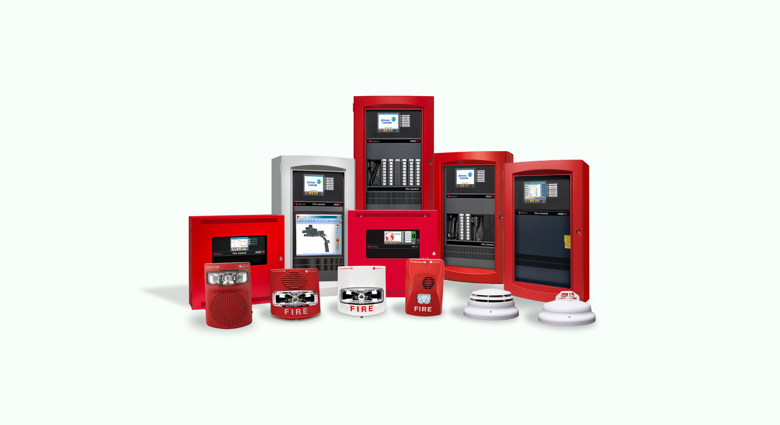Collection of fire alarm control panels and detectors in red, white, and black, including smoke and heat sensors.