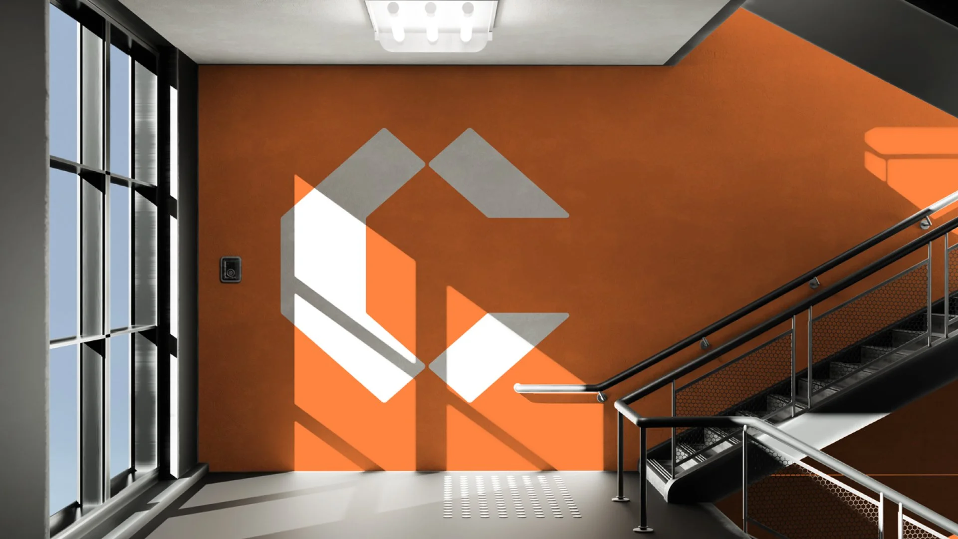 Modern staircase inside a building with an orange wall, a large window, and a geometric logo containing white, gray, and orange shapes projected onto the wall.