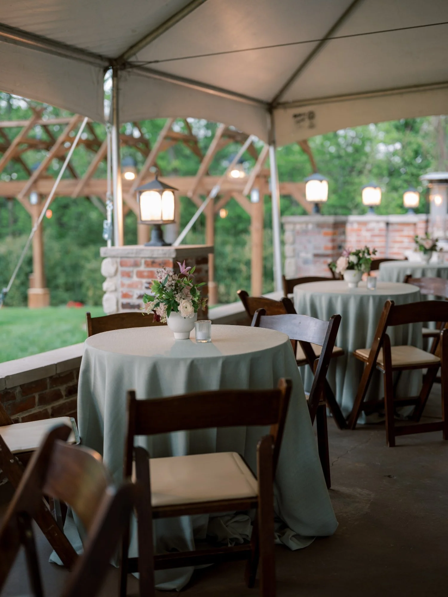 public-school-house-wedding-sage-linens-cocktail-tables.jpg