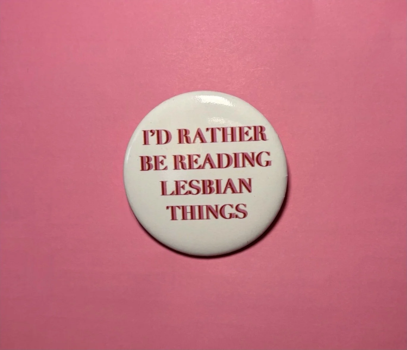 lesbian horror; horror books; I'd rather be reading lesbian horror; I'd rather be reading lesbian things button pin; horror movies; Nomad Nirvana Books; merch