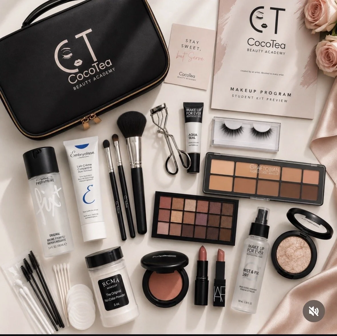 Makeup tools and products arranged on a white surface including brushes, eyelash curlers, powders, lipsticks, and eyeshadow palettes, with a black CocoTea beauty bag and a makeup program brochure.