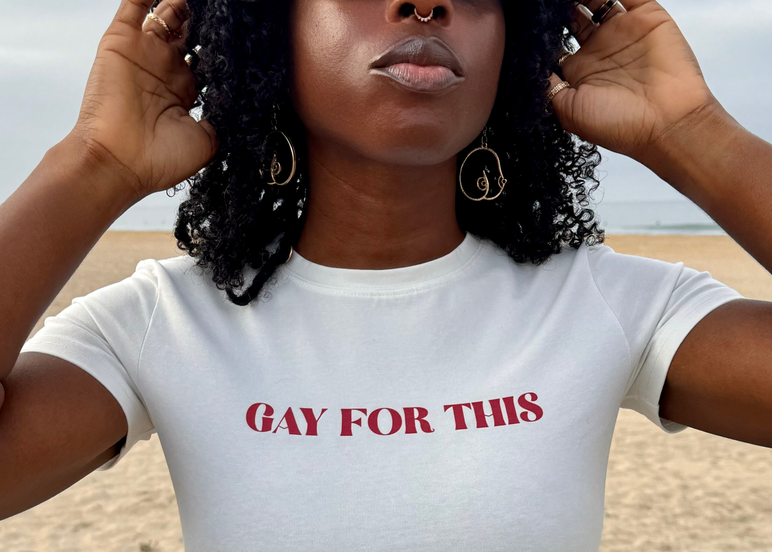 person wearing white gay for this tee