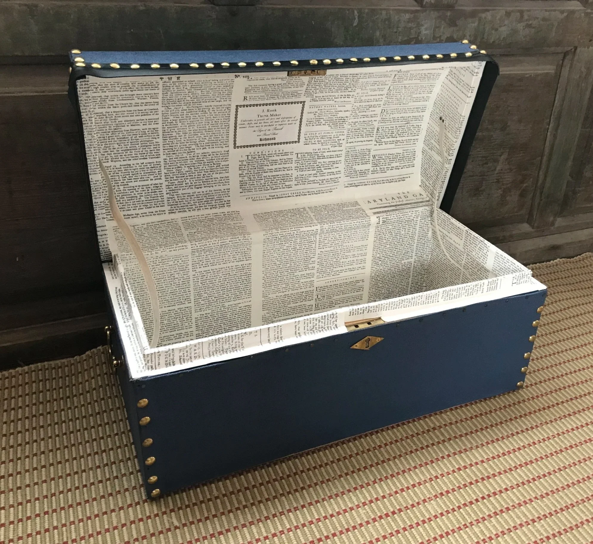 Lined with facsimile newspaper