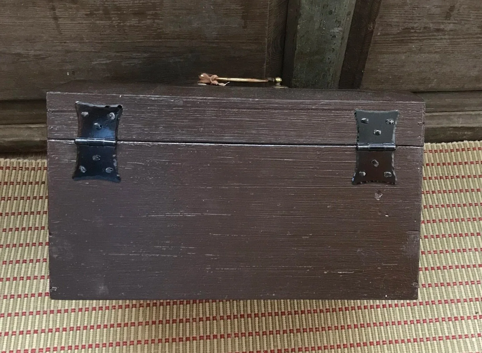 Again, butterfly hinges secured with clenched nails.