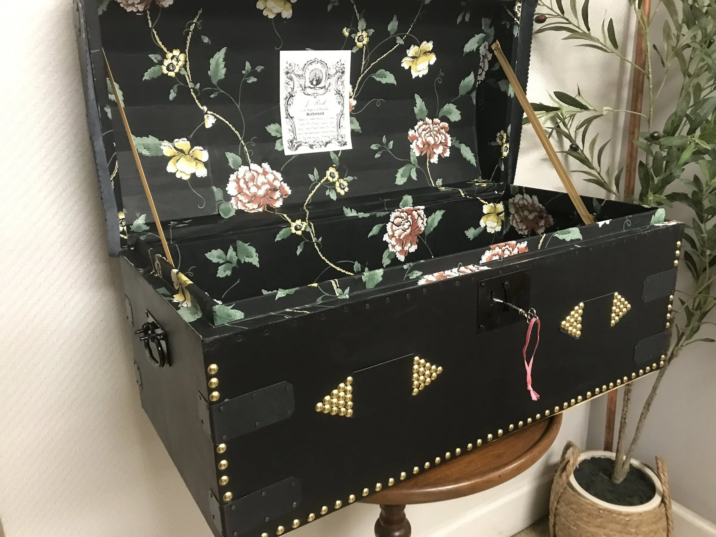 Yes, this is 18thc. reproduction wallpaper. Although as a note, wallpaper when used for lining trunks was normally light in color.