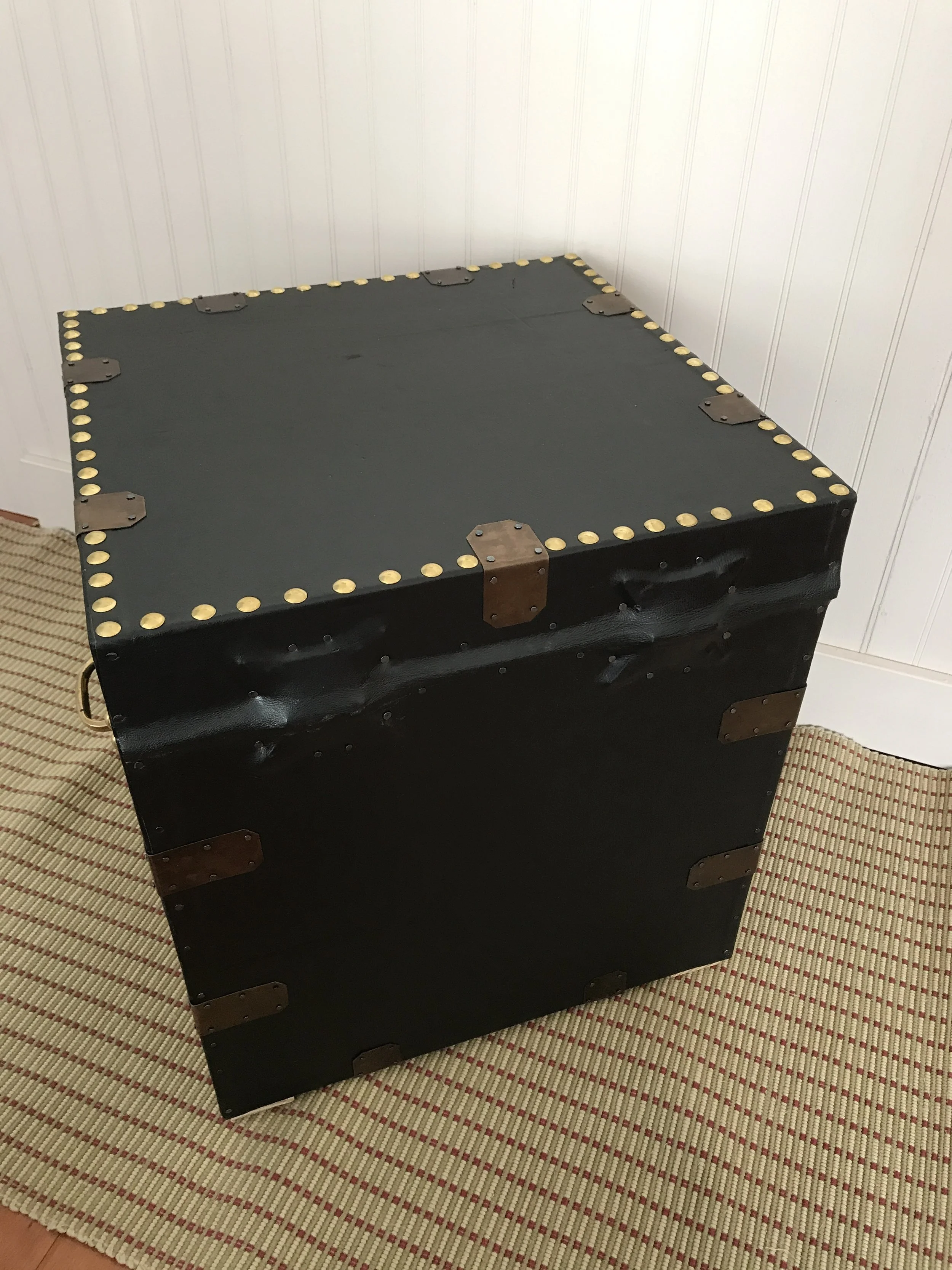 Reverse as usual, unornamented and with hinges covered
