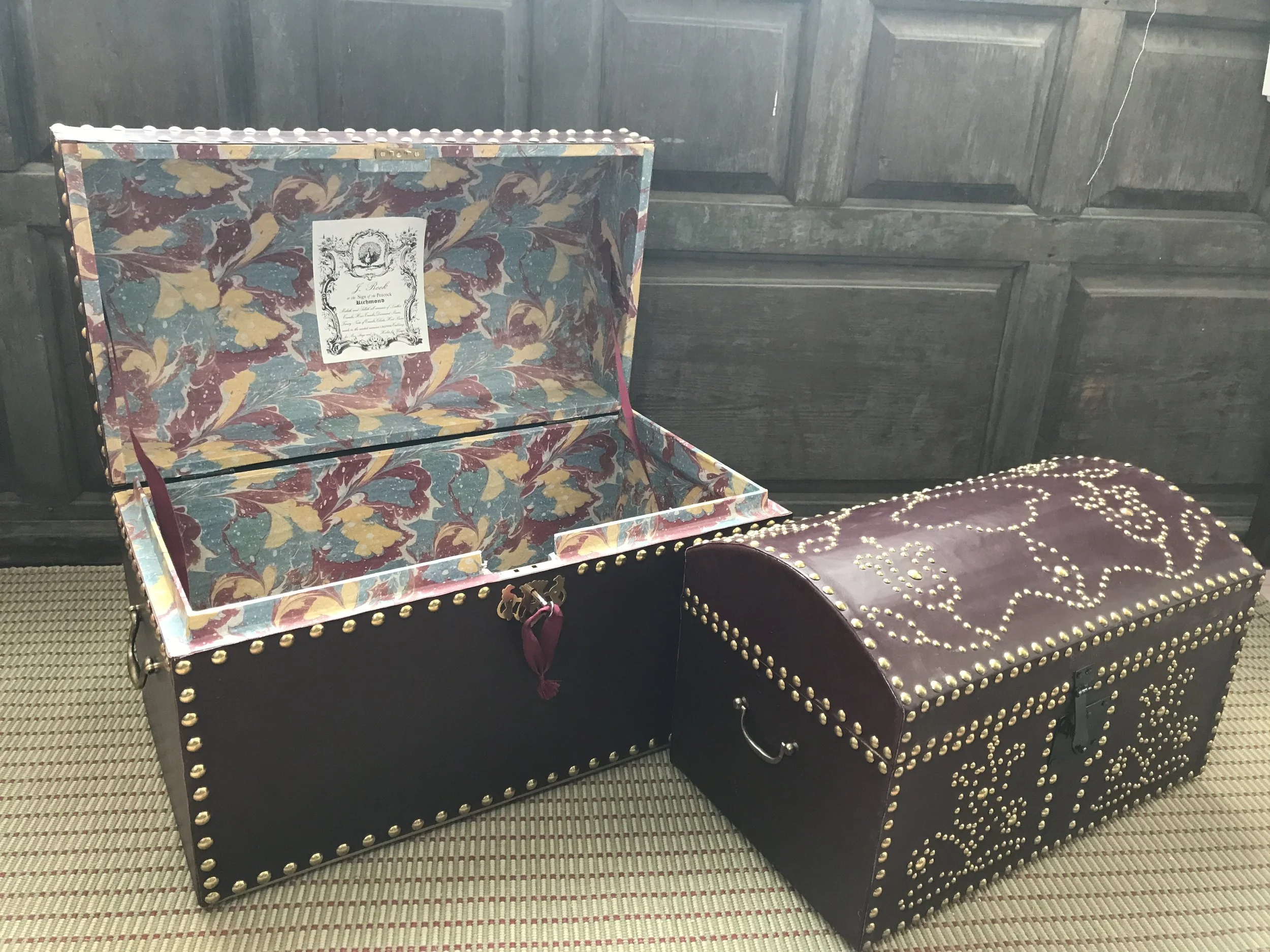 The two smaller trunks, the larger with French "marbled" paper